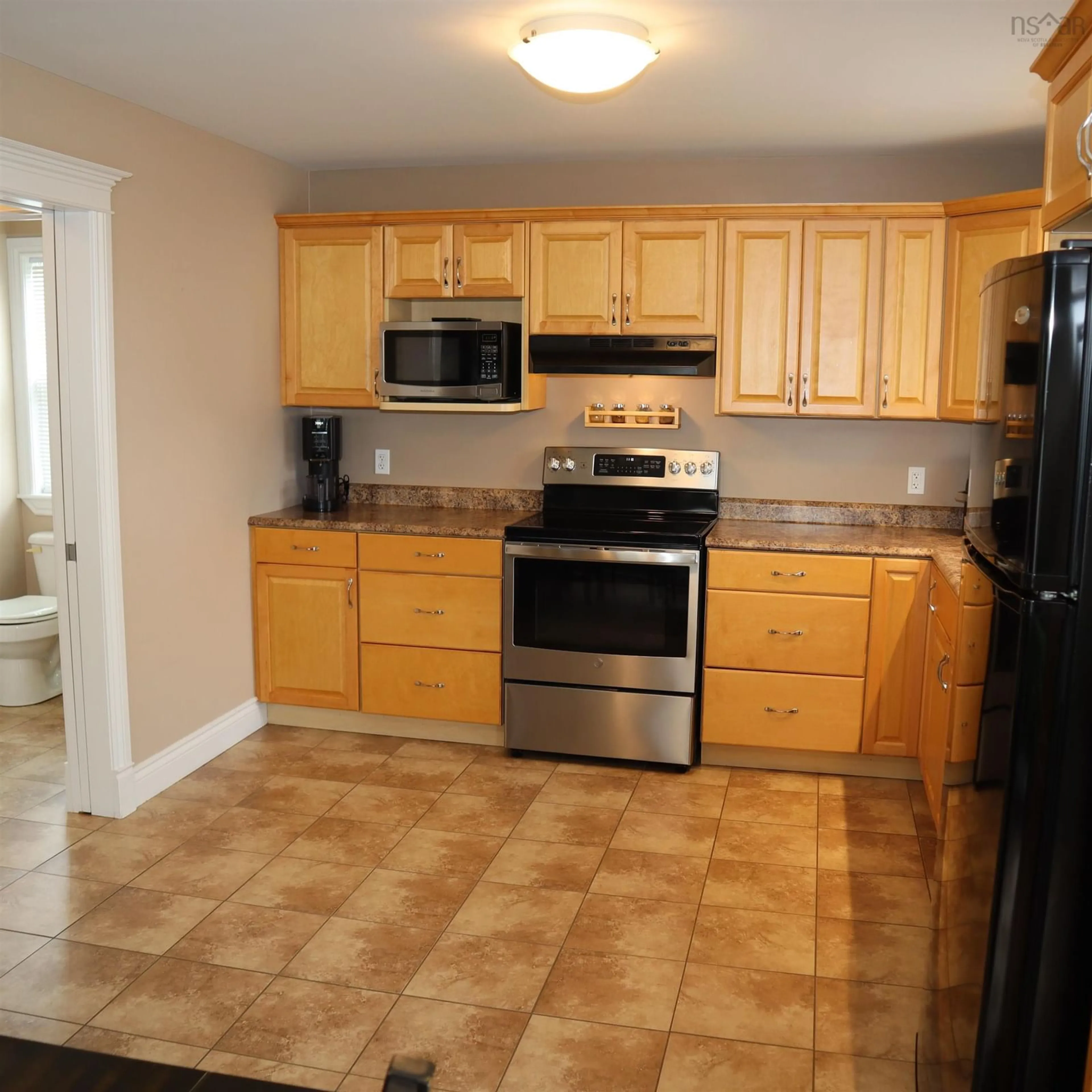 Standard kitchen, ceramic/tile floor for 77 St Clair Ave, Dartmouth Nova Scotia B2X 0B2