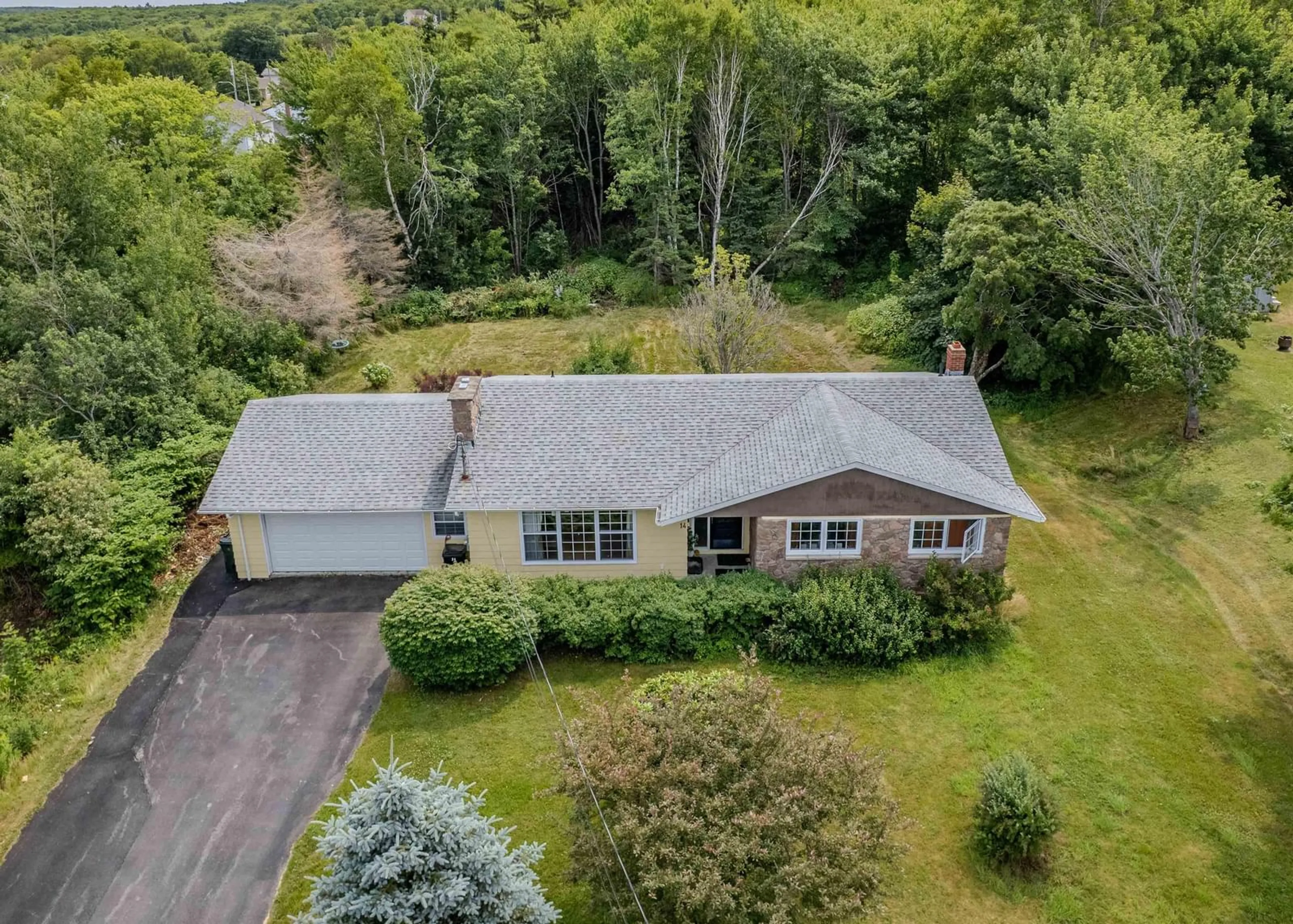 A pic from outside/outdoor area/front of a property/back of a property/a pic from drone, unknown for 14 Tower Hts, Sydney Nova Scotia B1P 2C4