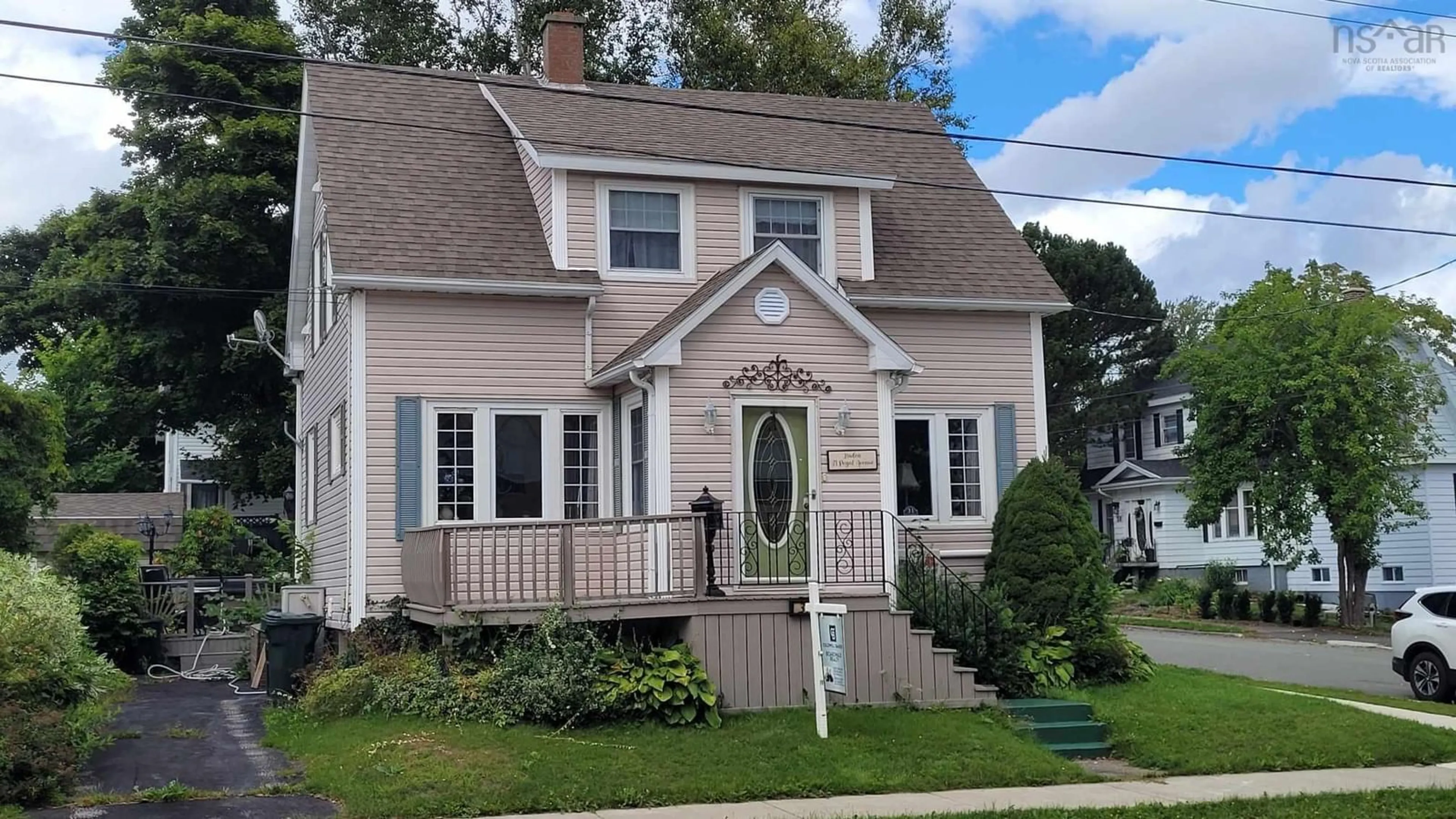 Home with vinyl exterior material, street for 31 Royal Ave, Sydney Nova Scotia B1P 4M1
