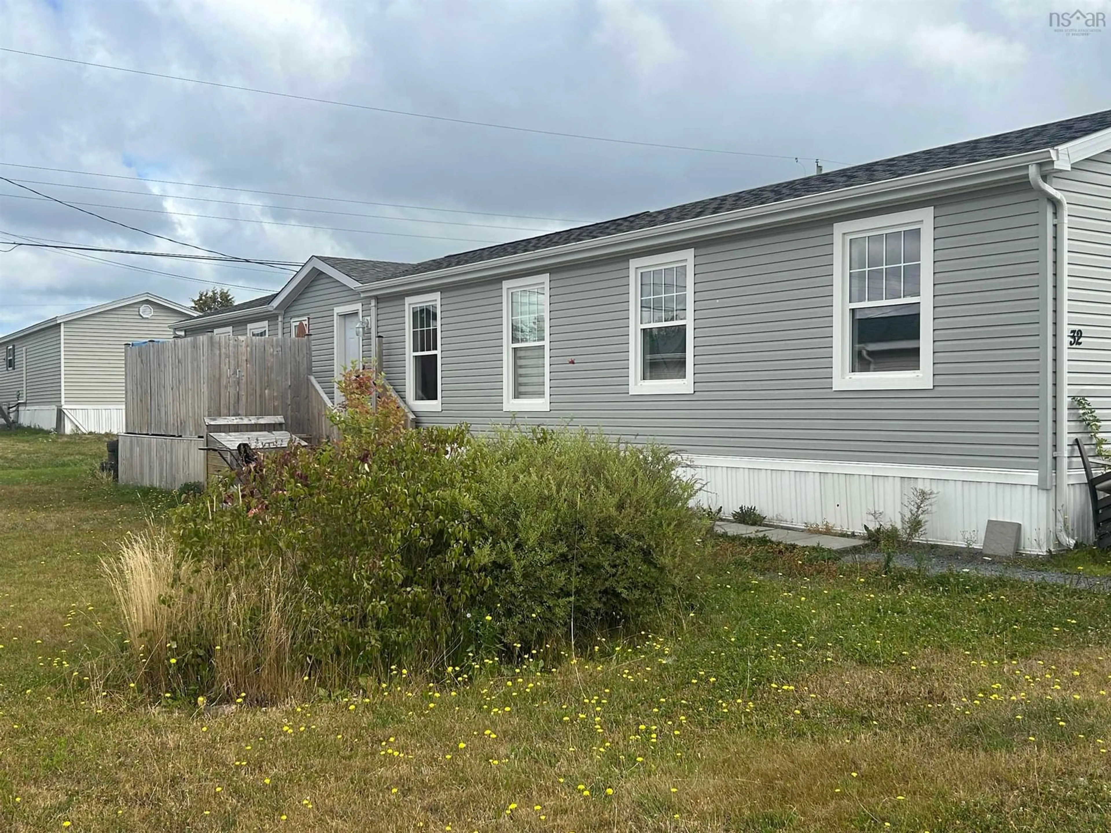 Home with vinyl exterior material, street for 32 Rogers Drive, Lower South River Nova Scotia B2G 0E7
