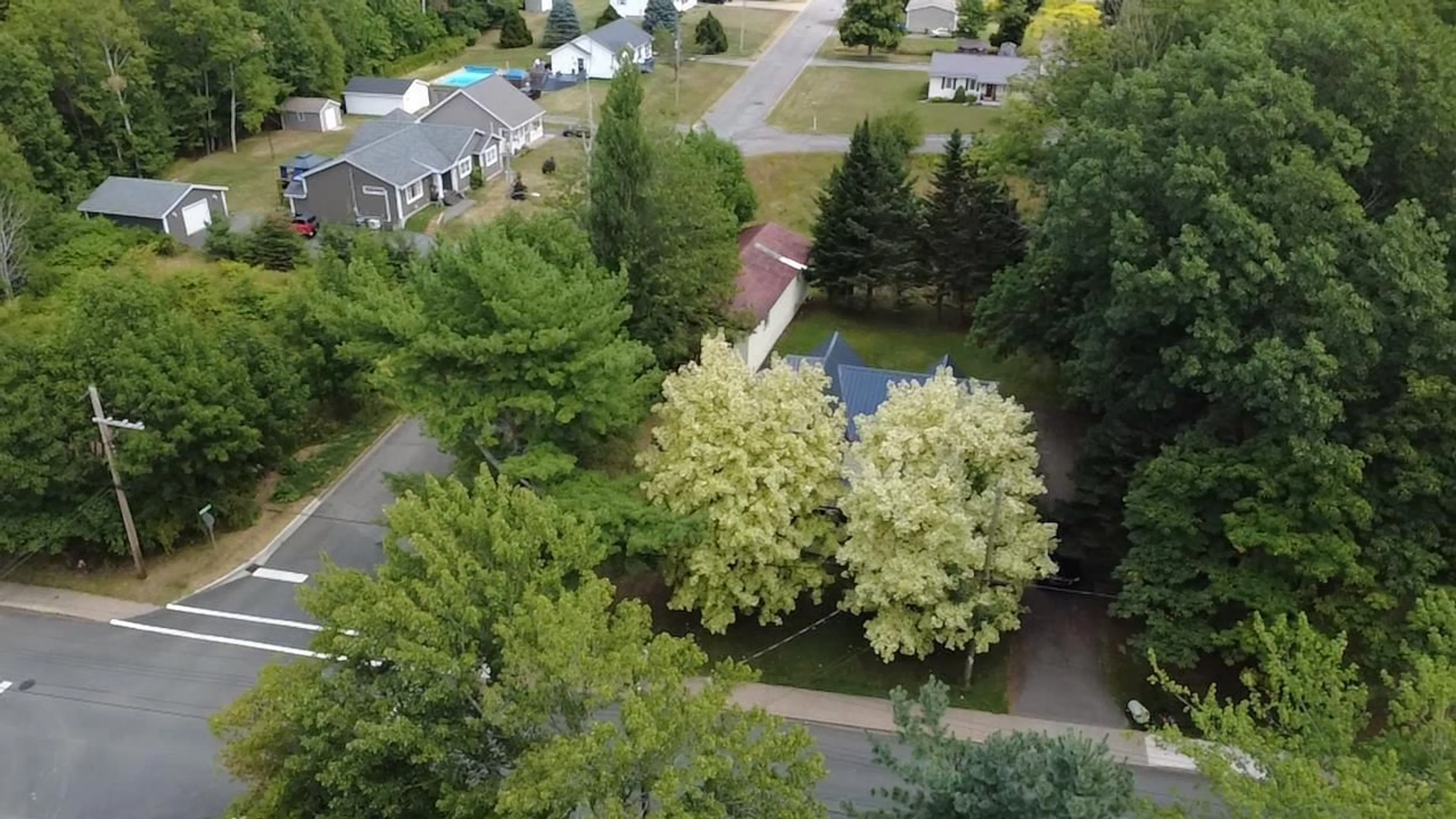 A pic from outside/outdoor area/front of a property/back of a property/a pic from drone, unknown for 58 Seventh St, Trenton Nova Scotia B0K 1X0
