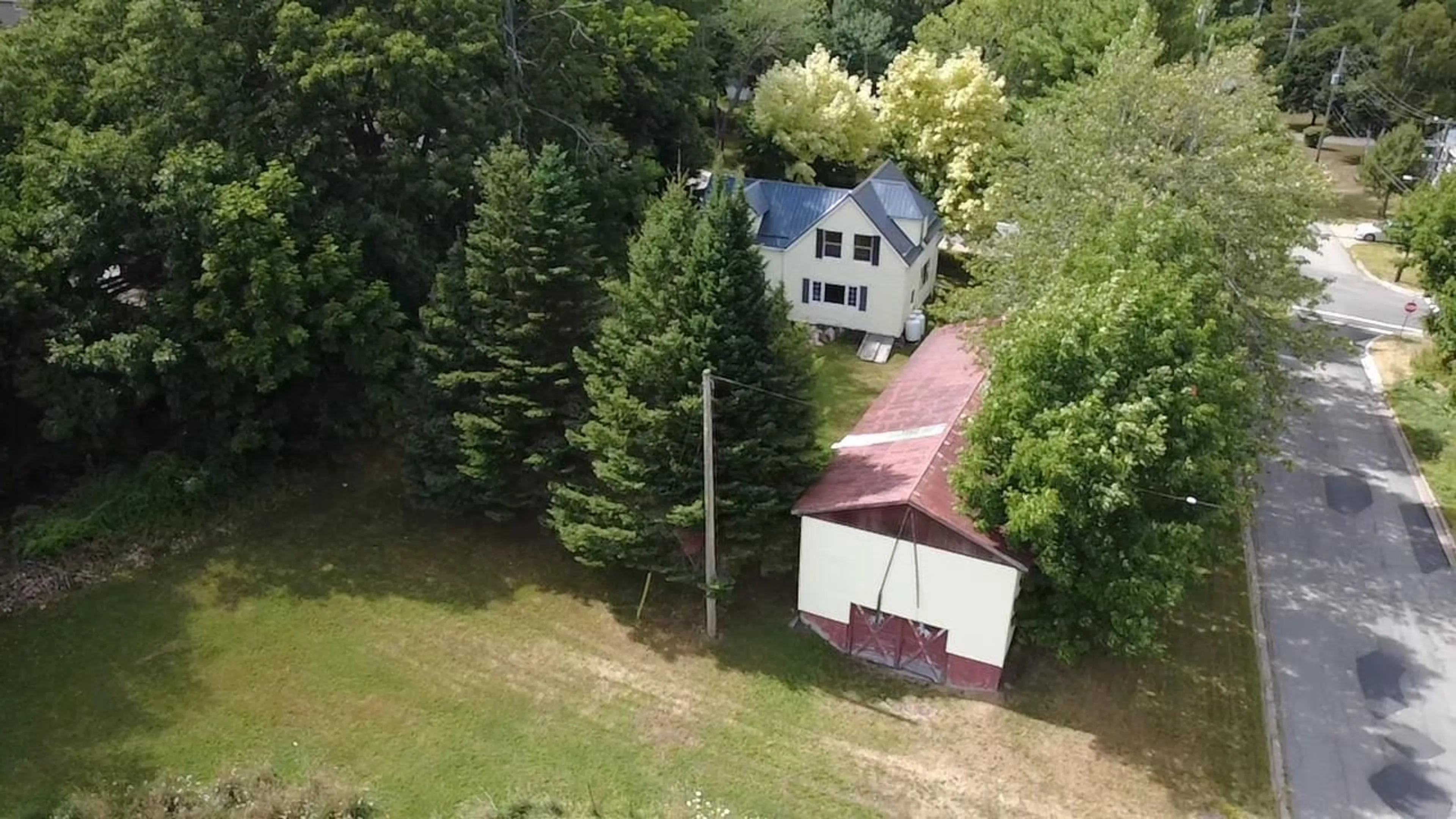 A pic from outside/outdoor area/front of a property/back of a property/a pic from drone, unknown for 58 Seventh St, Trenton Nova Scotia B0K 1X0