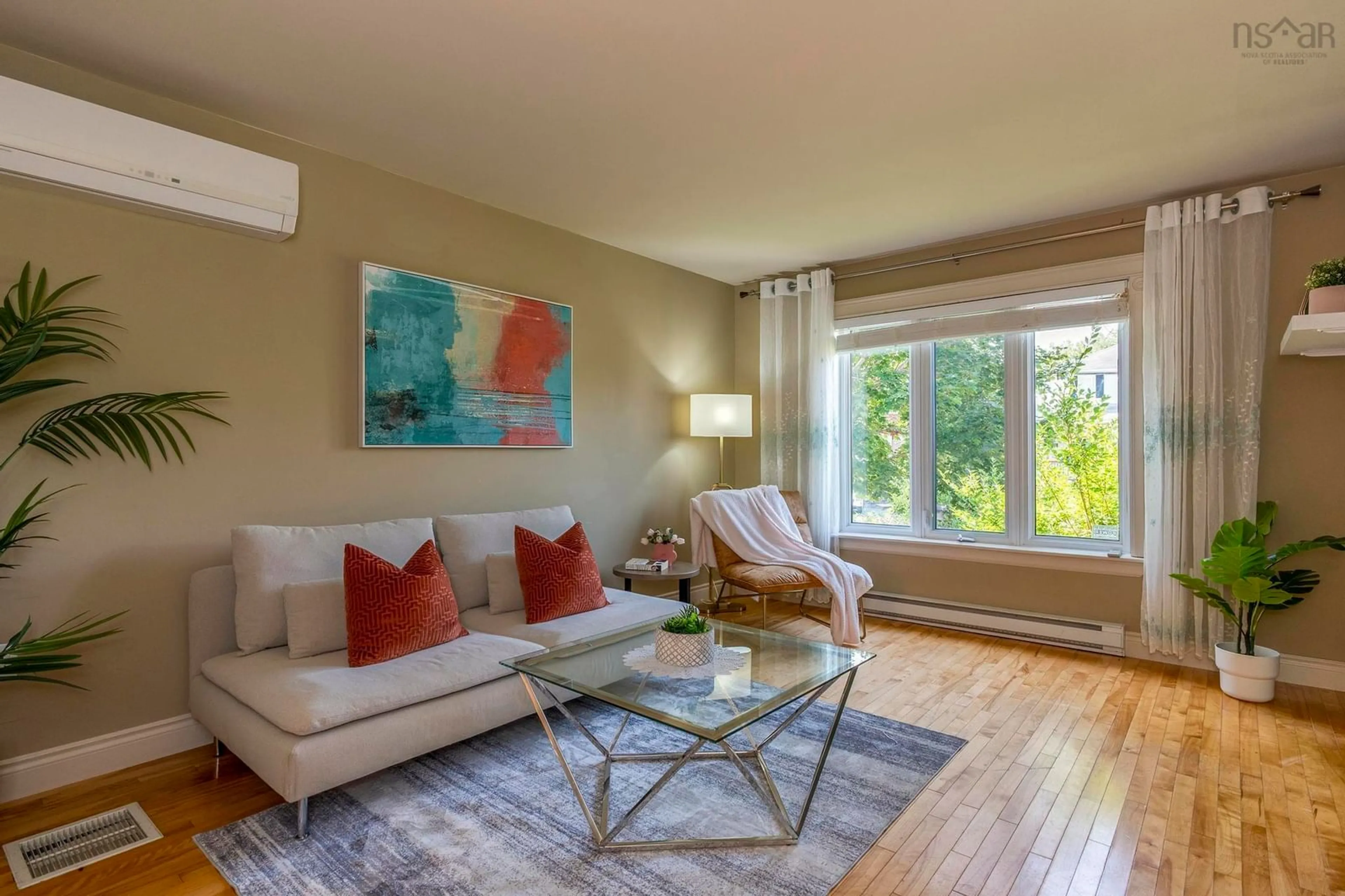 Living room with furniture, wood/laminate floor for 18 Anahid Crt, Bedford Nova Scotia B4A 3X2