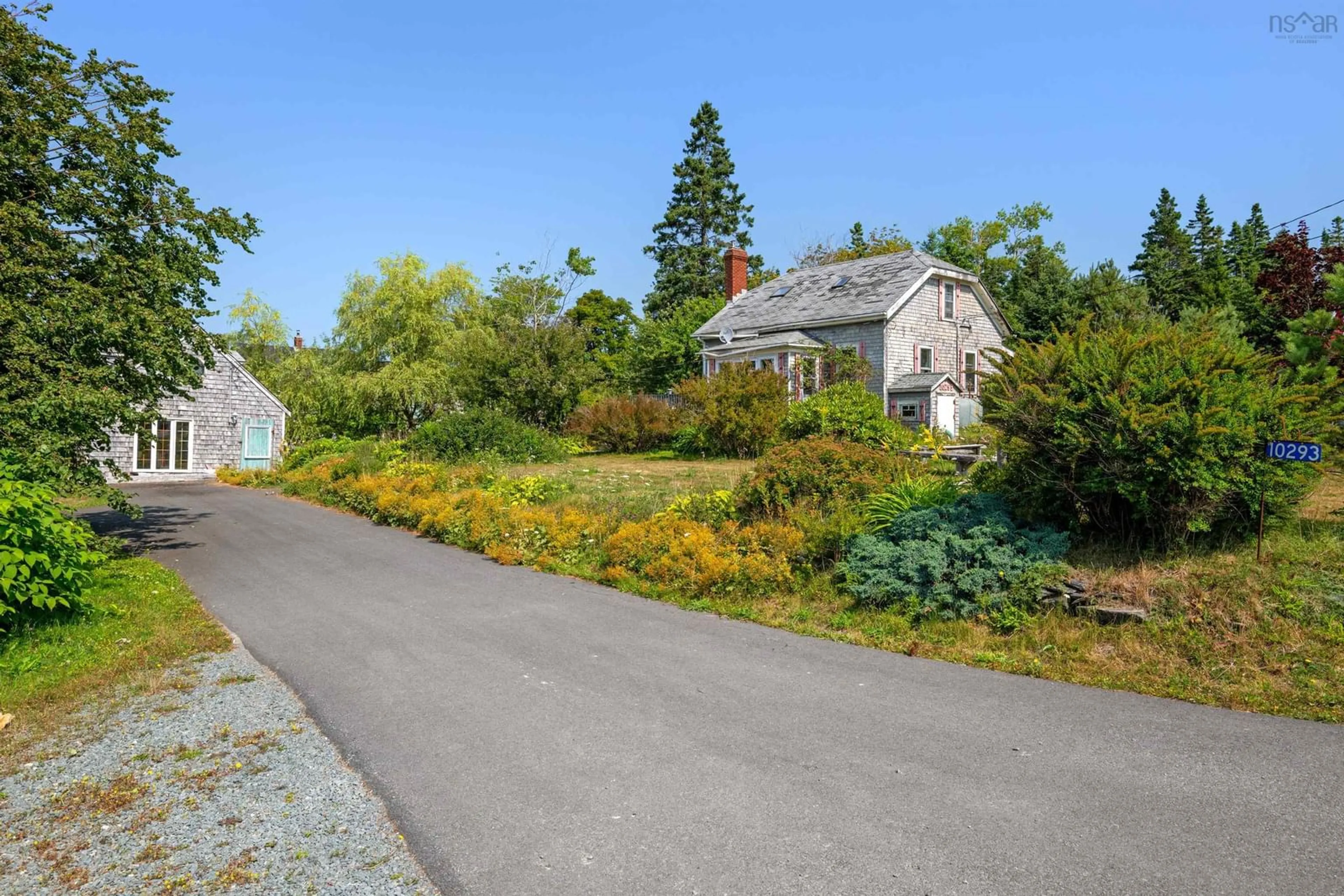 A pic from outside/outdoor area/front of a property/back of a property/a pic from drone, street for 10293 Highway 7, Oyster Pond Nova Scotia B0J 1P0