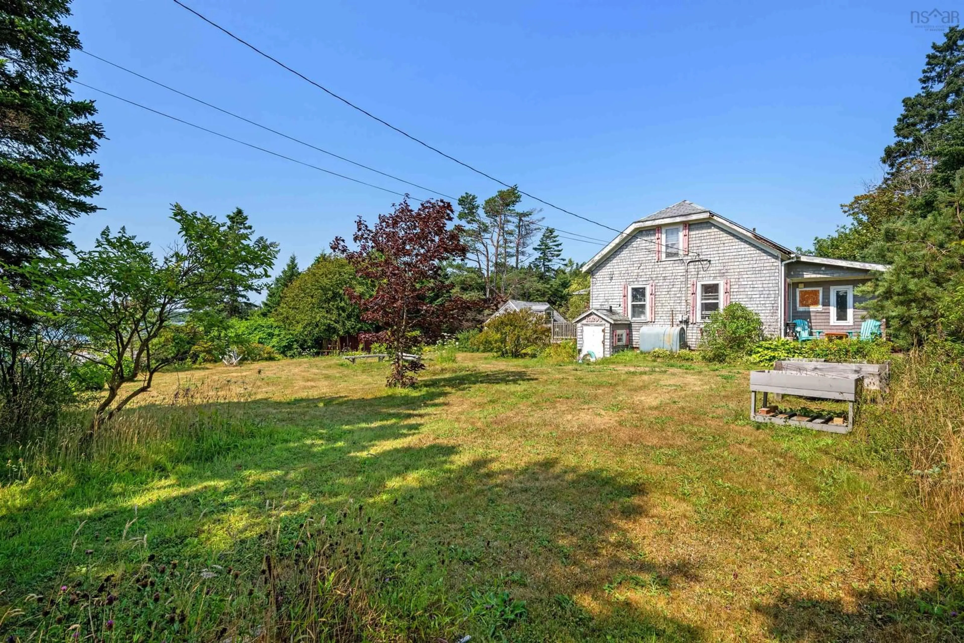 A pic from outside/outdoor area/front of a property/back of a property/a pic from drone, building for 10293 Highway 7, Oyster Pond Nova Scotia B0J 1P0