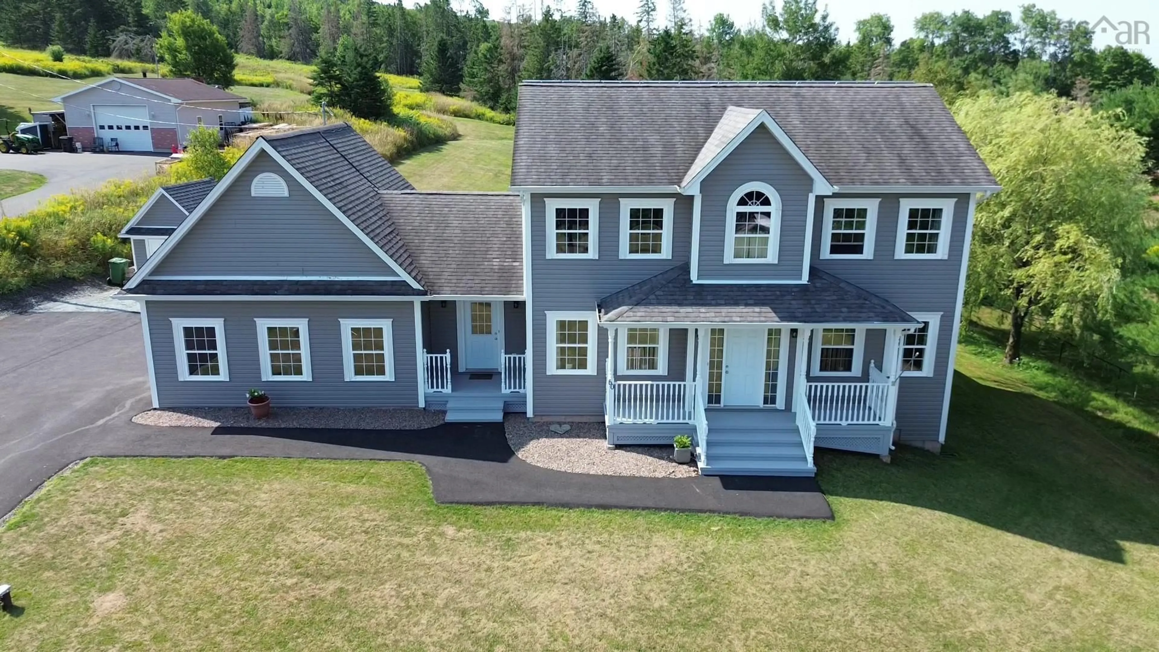 A pic from outside/outdoor area/front of a property/back of a property/a pic from drone, unknown for 60 Glenabbey Dr, Murray Siding Nova Scotia B6L 3L2