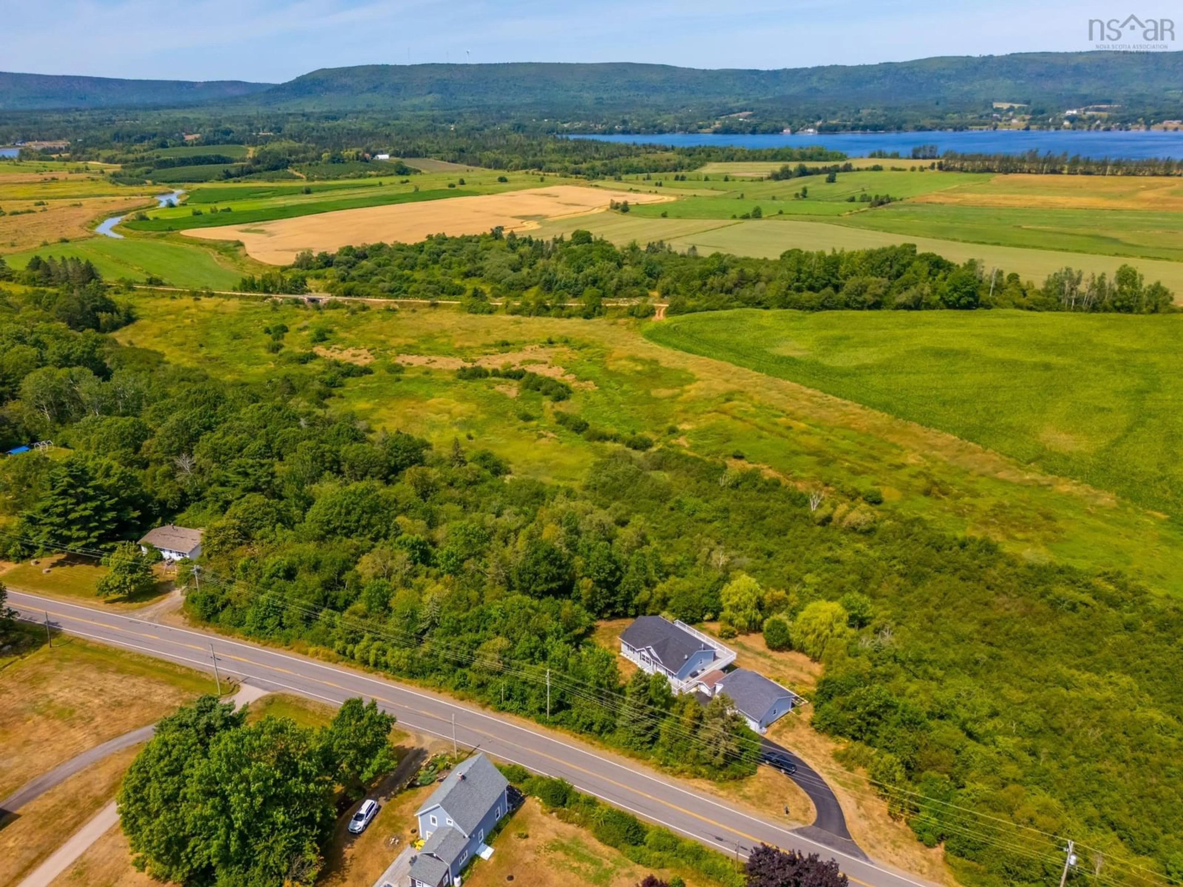 A pic from outside/outdoor area/front of a property/back of a property/a pic from drone, water/lake/river/ocean view for 1241 Highway 201, Round Hill Nova Scotia B0S 1A0