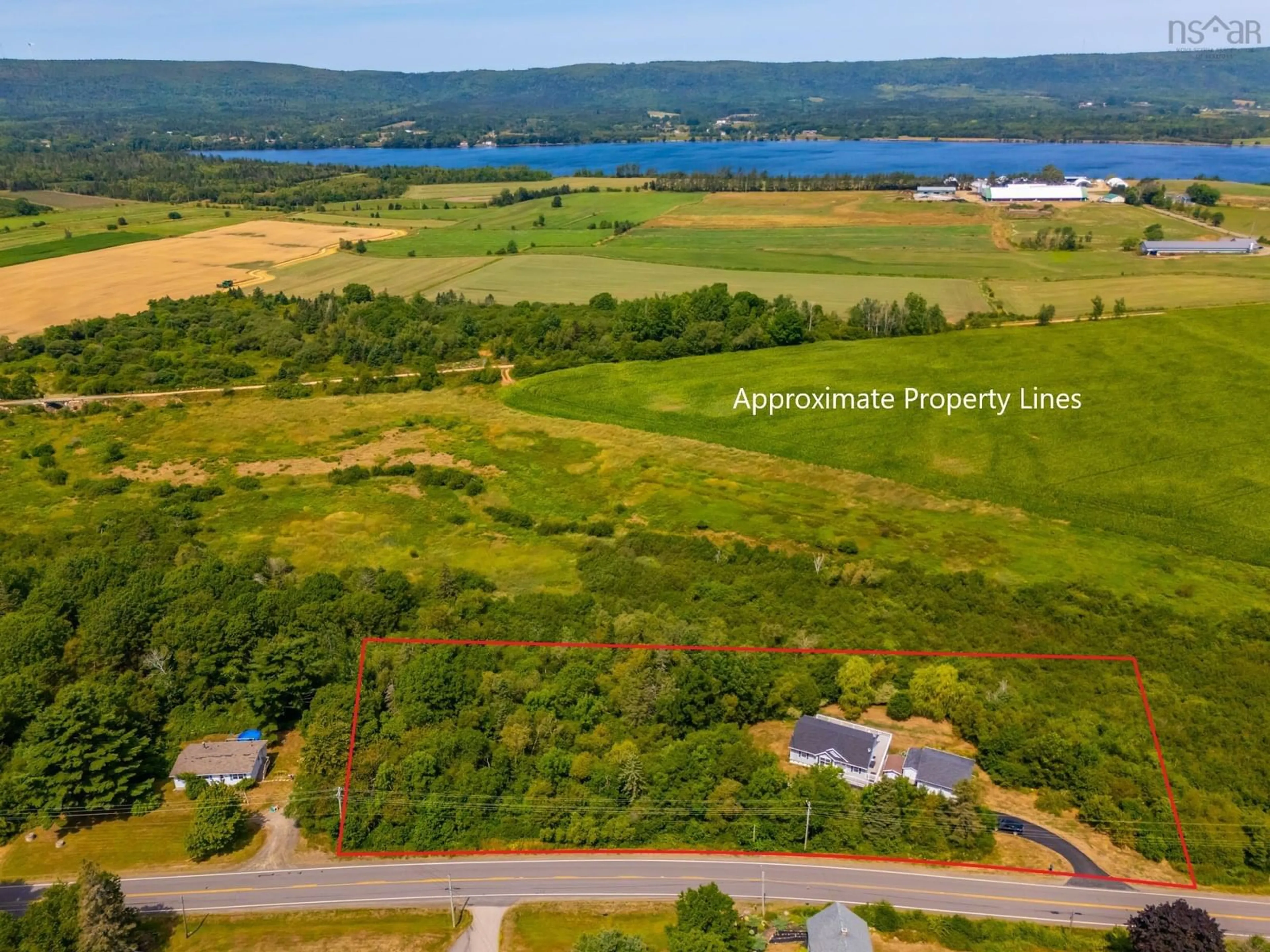 A pic from outside/outdoor area/front of a property/back of a property/a pic from drone, water/lake/river/ocean view for 1241 Highway 201, Round Hill Nova Scotia B0S 1A0
