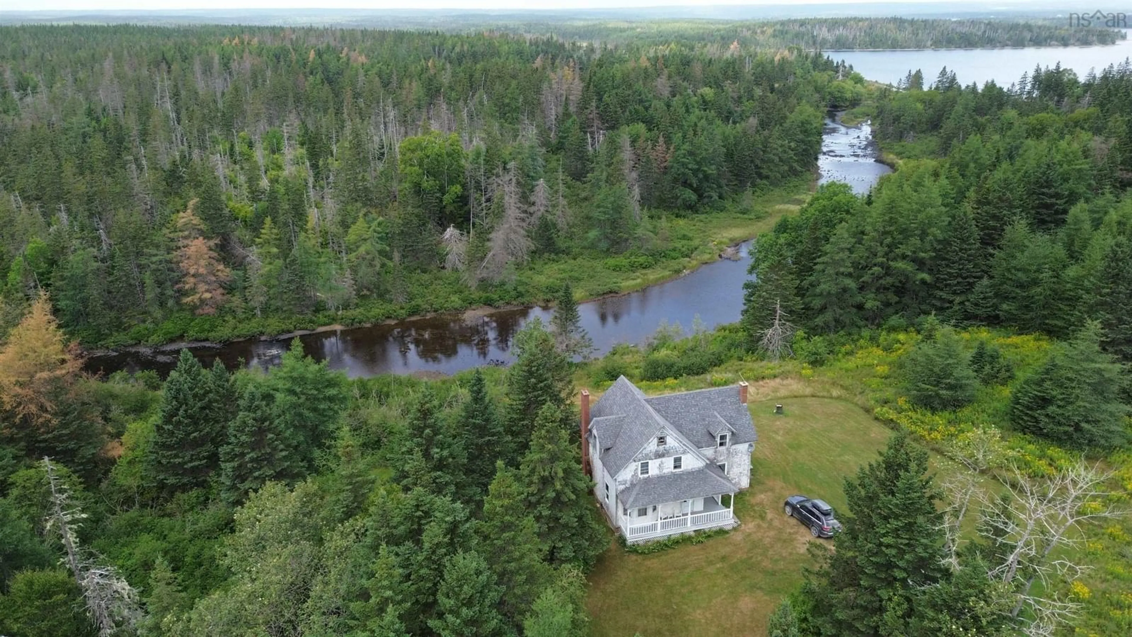 A pic from outside/outdoor area/front of a property/back of a property/a pic from drone, water/lake/river/ocean view for 2121 Loch Lomond Rd, Loch Lomond Nova Scotia B2E 1E3