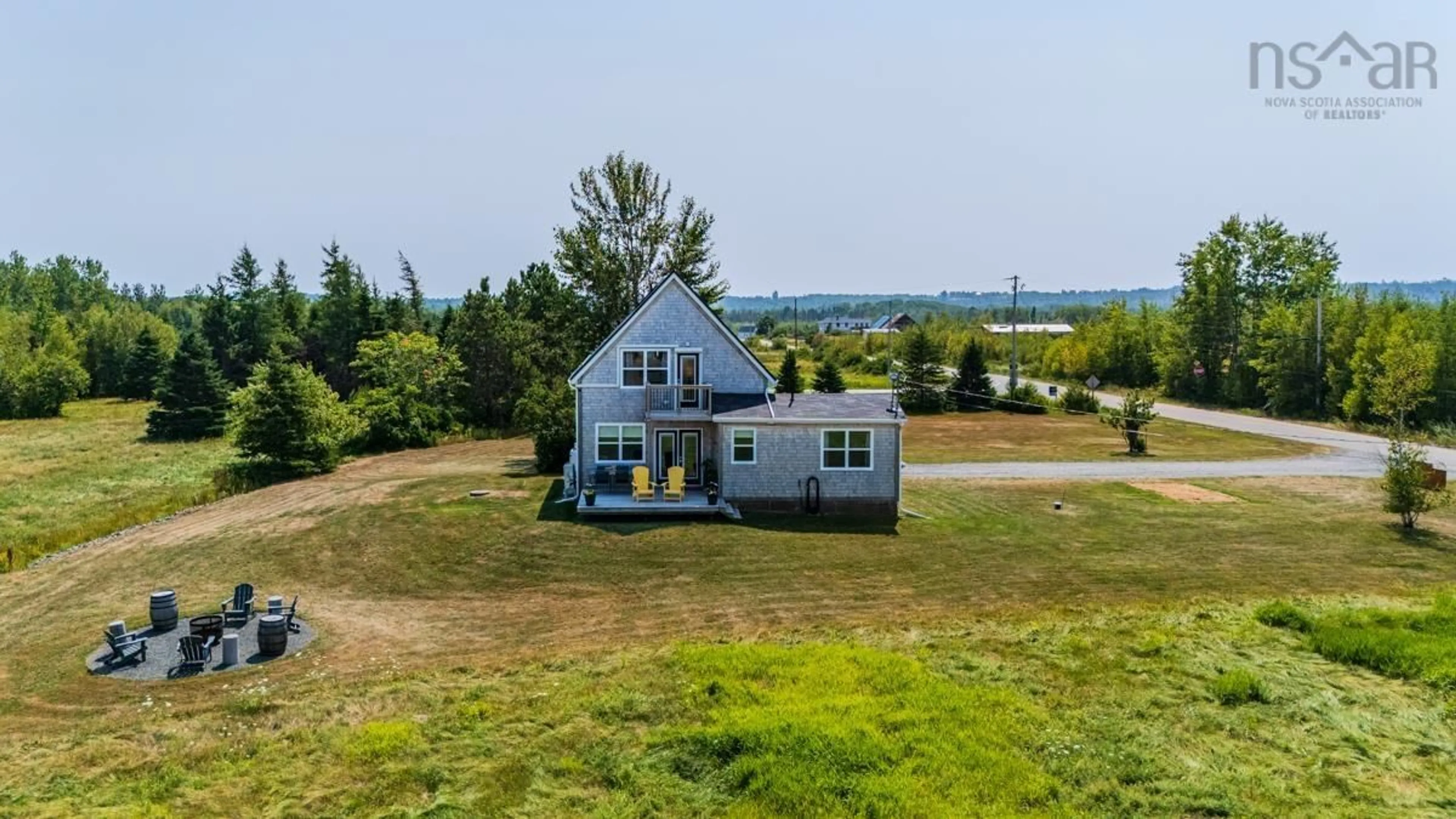 A pic from outside/outdoor area/front of a property/back of a property/a pic from drone, water/lake/river/ocean view for 6 Horton Point Rd, Malagash Nova Scotia B0K 1E0