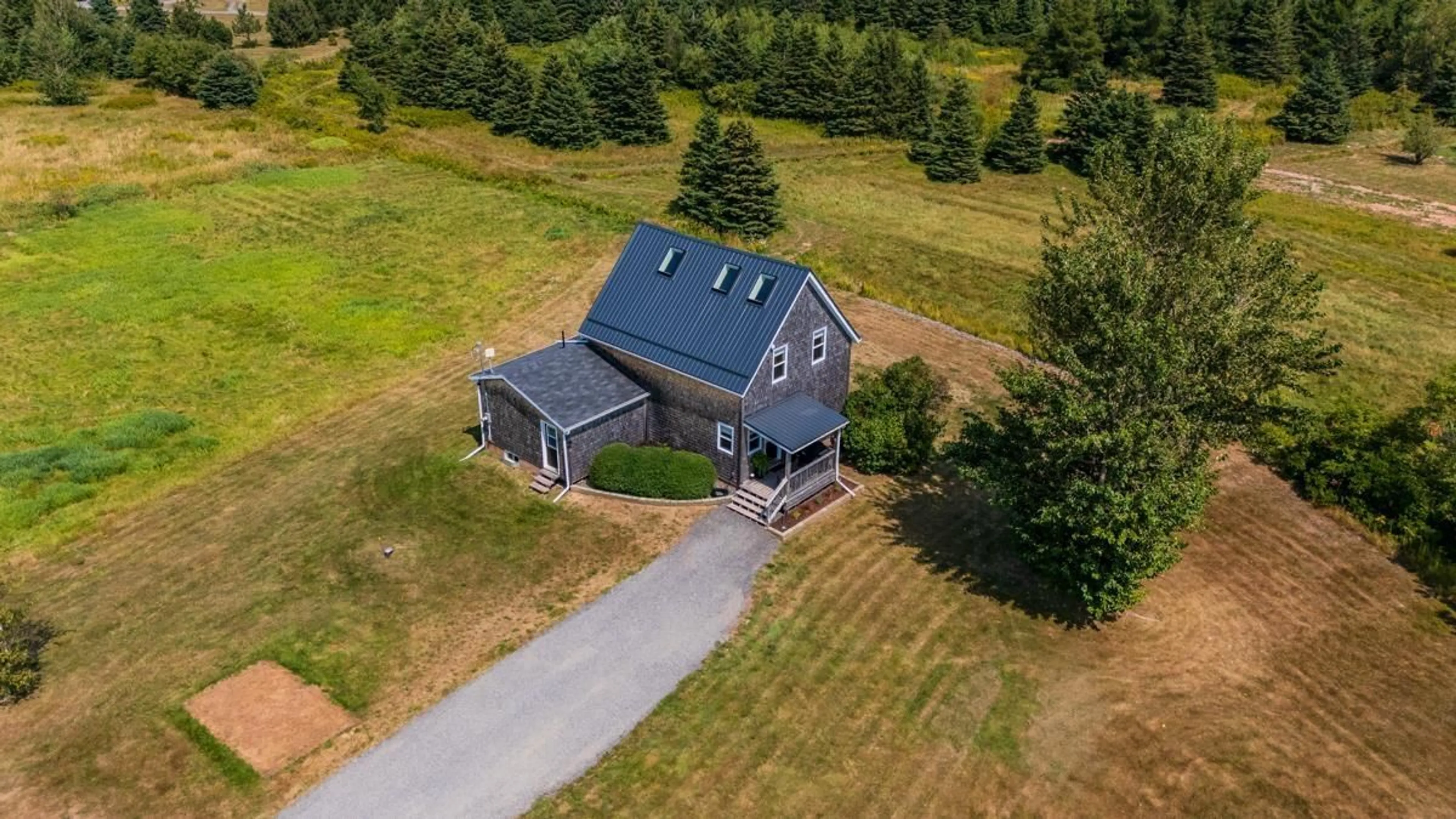 A pic from outside/outdoor area/front of a property/back of a property/a pic from drone, unknown for 6 Horton Point Rd, Malagash Nova Scotia B0K 1E0