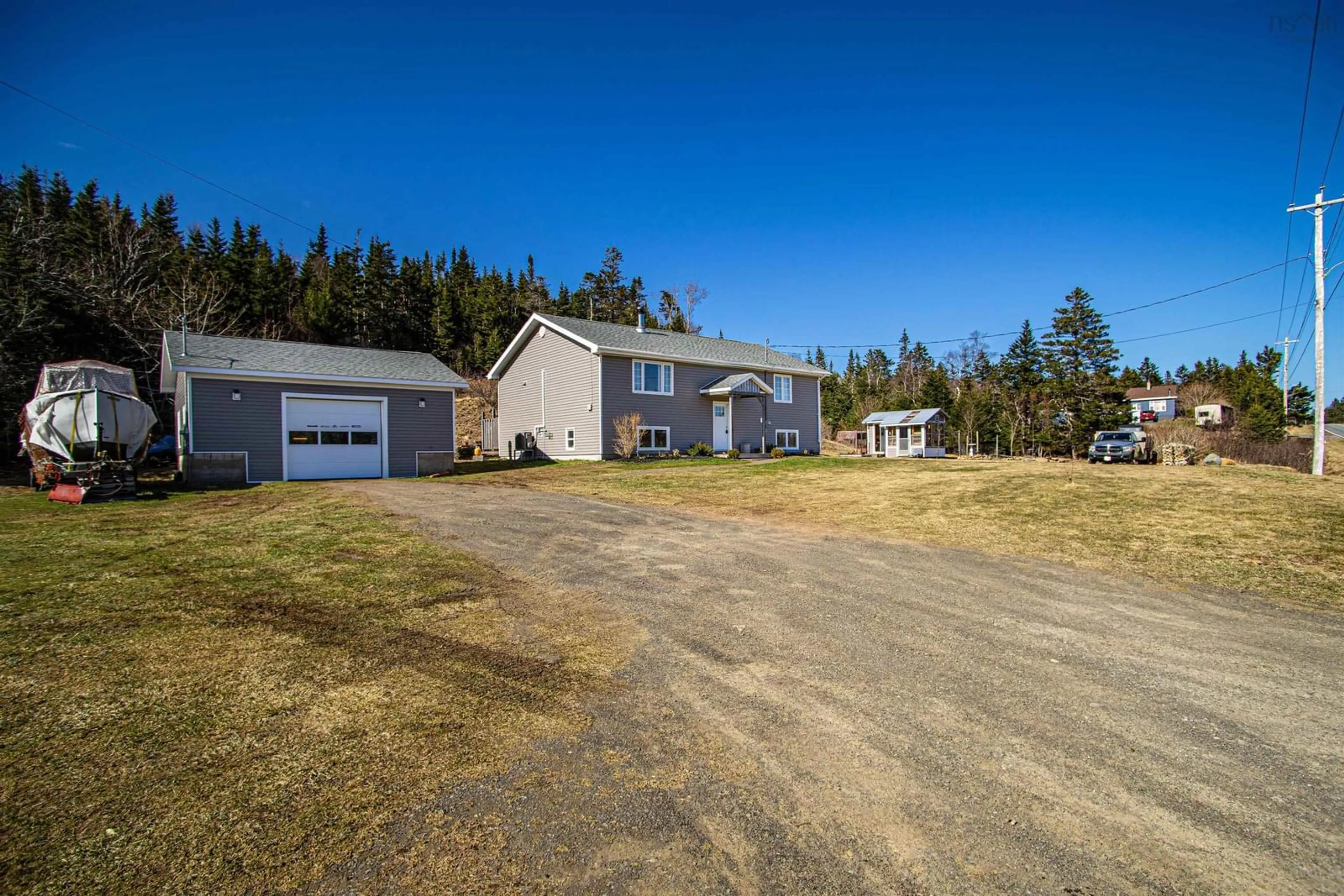 A pic from outside/outdoor area/front of a property/back of a property/a pic from drone, unknown for 3681 Highway 217, East Ferry Nova Scotia B0V 1A0
