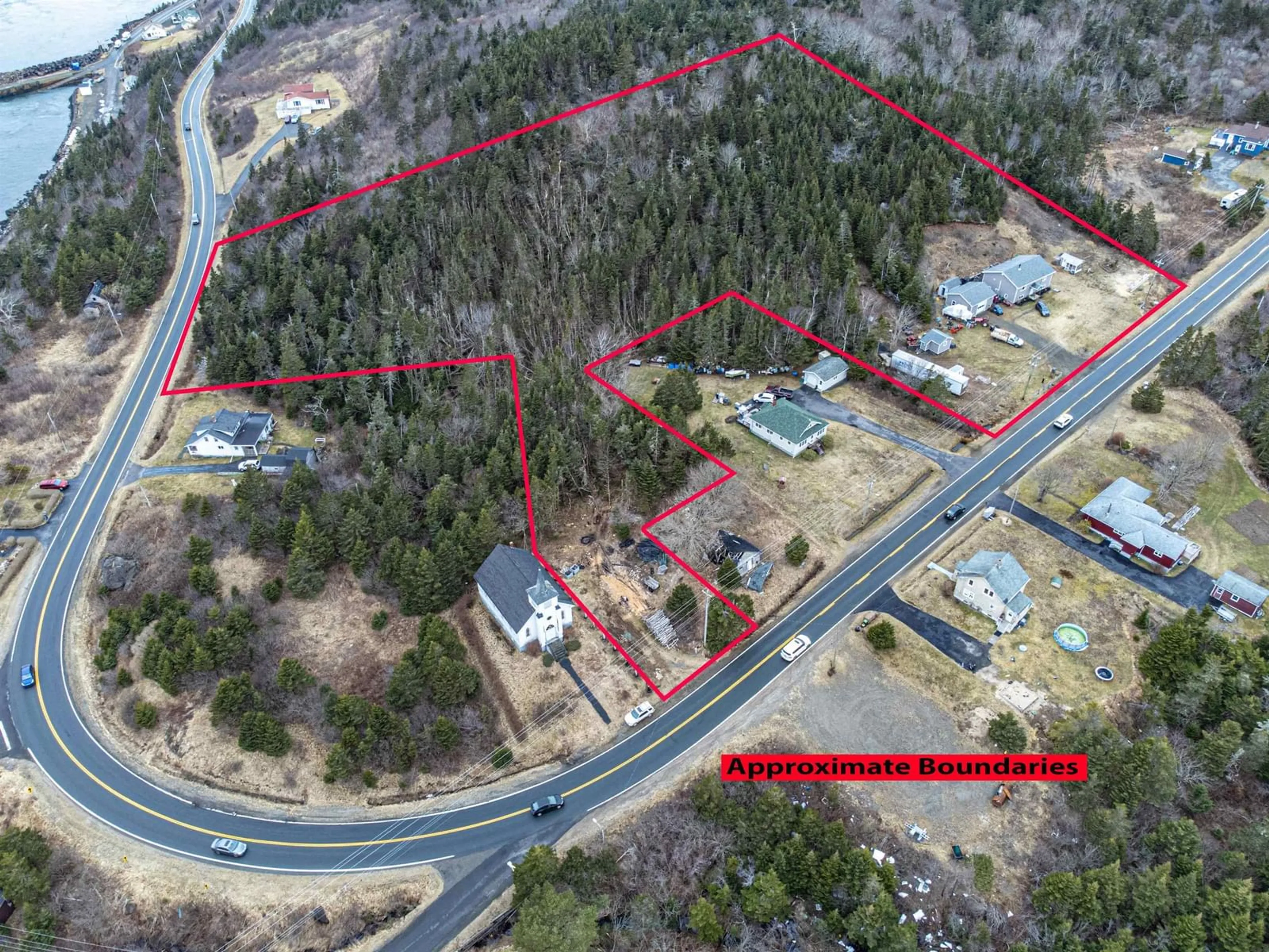 A pic from outside/outdoor area/front of a property/back of a property/a pic from drone, street for 3681 Highway 217, East Ferry Nova Scotia B0V 1A0