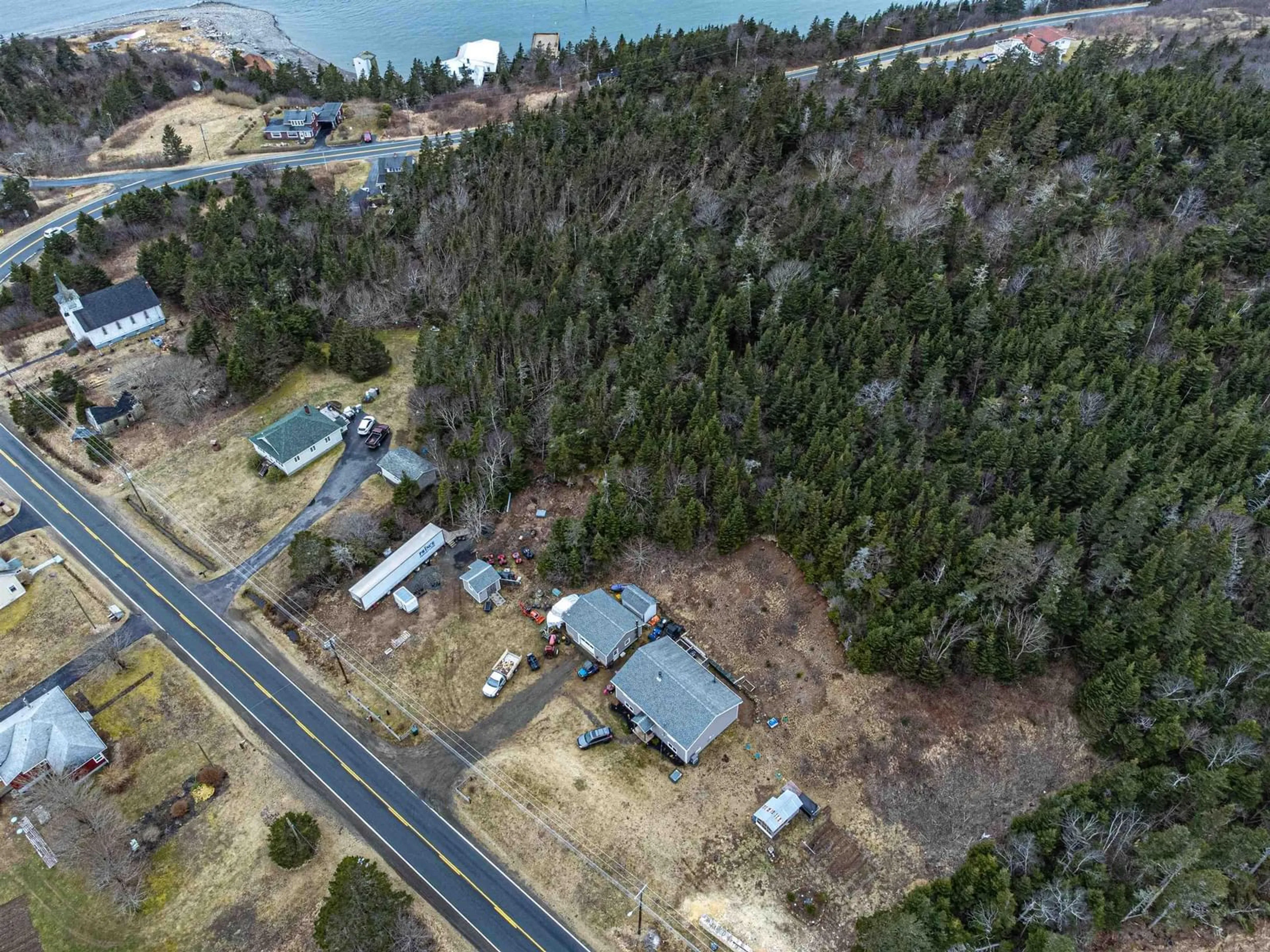 A pic from outside/outdoor area/front of a property/back of a property/a pic from drone, unknown for 3681 Highway 217, East Ferry Nova Scotia B0V 1A0