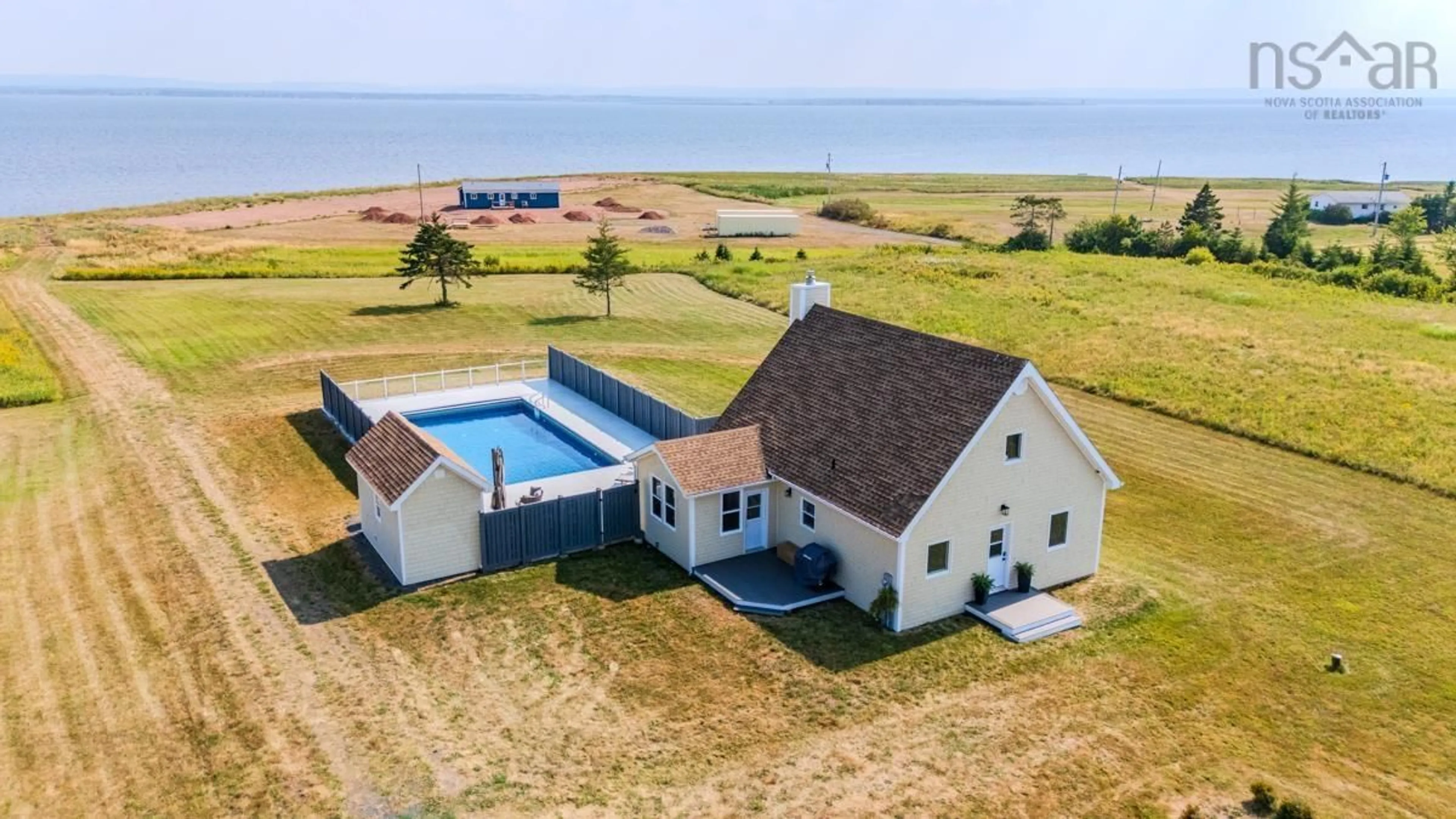 A pic from outside/outdoor area/front of a property/back of a property/a pic from drone, water/lake/river/ocean view for 4376 Malagash Rd, Malagash Nova Scotia B0K 1E0