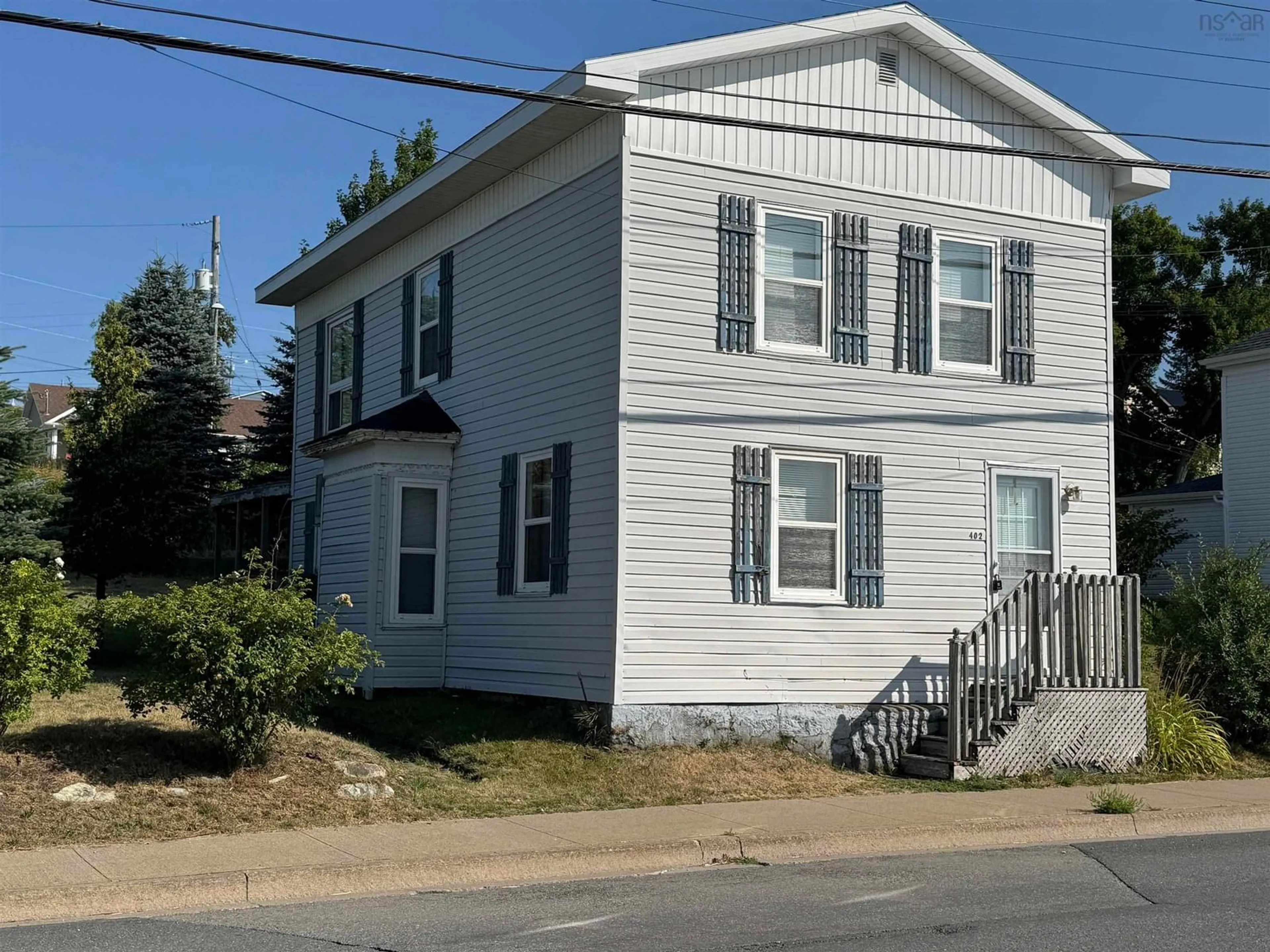 Home with vinyl exterior material, building for 402 Purves St, North Sydney Nova Scotia B2A 1C6