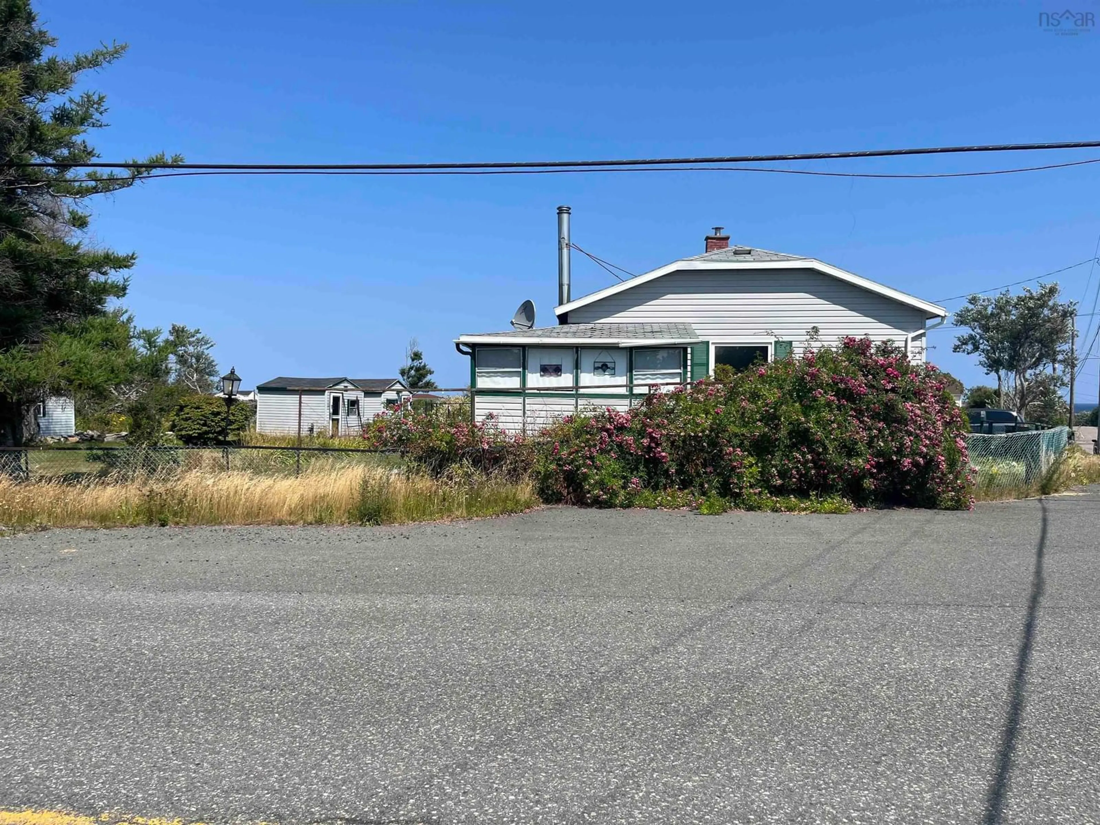 A pic from outside/outdoor area/front of a property/back of a property/a pic from drone, street for 742 Donkin Hwy, Donkin Nova Scotia B1A 6P1