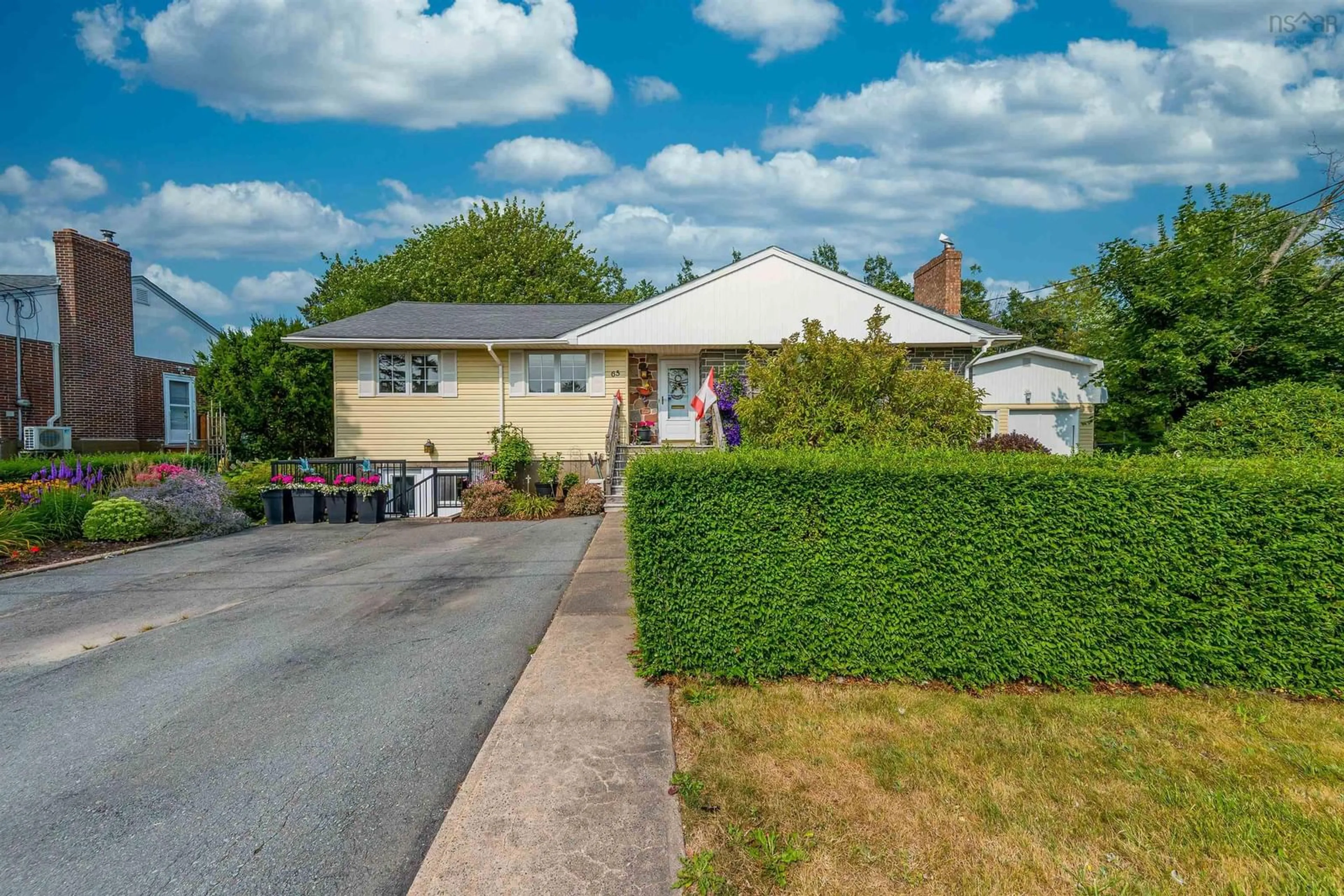 A pic from outside/outdoor area/front of a property/back of a property/a pic from drone, street for 65 Penhorn Dr, Dartmouth Nova Scotia B2Y 3K6