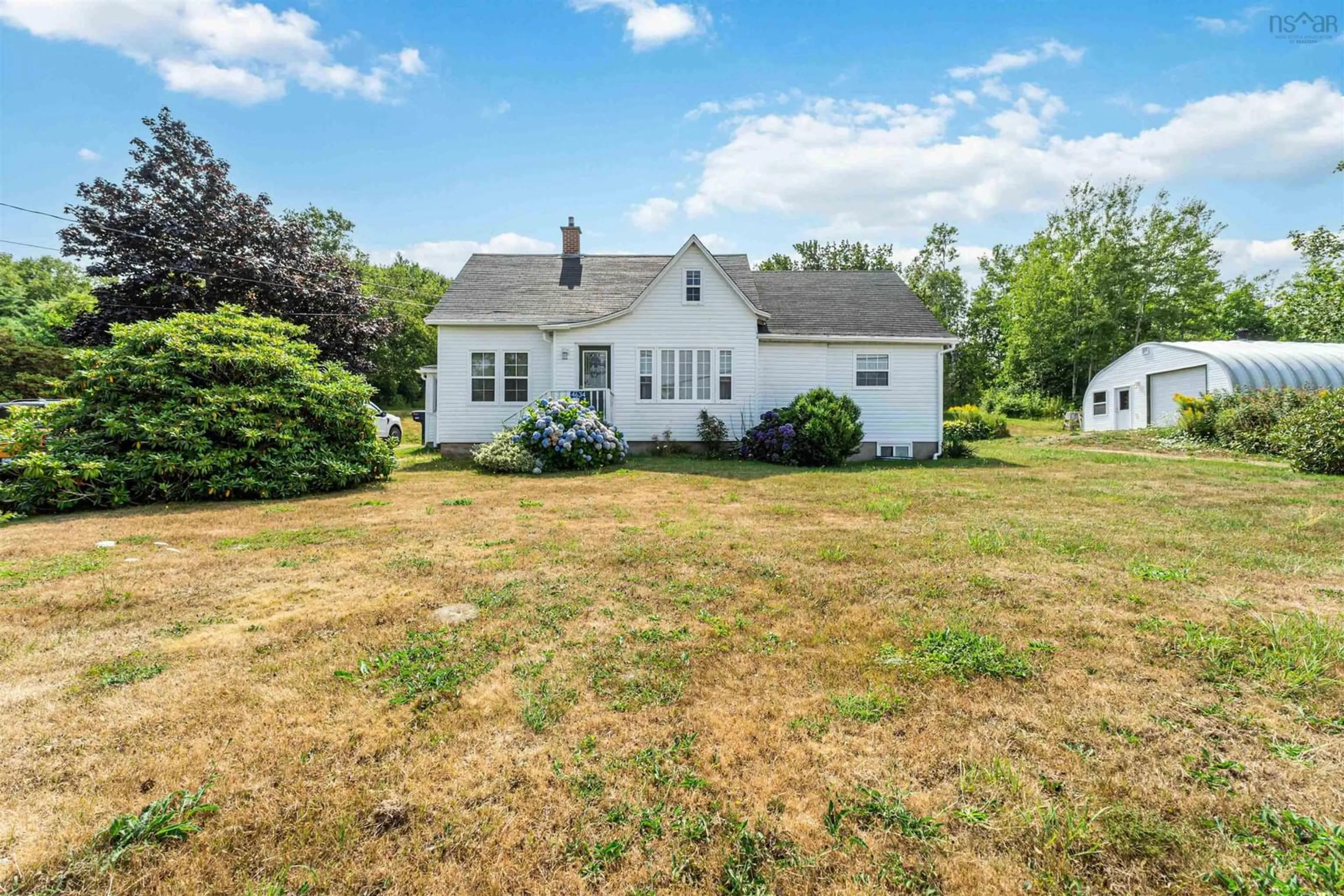 A pic from outside/outdoor area/front of a property/back of a property/a pic from drone, unknown for 4634 Shore Rd, Parkers Cove Nova Scotia B0S 1A0
