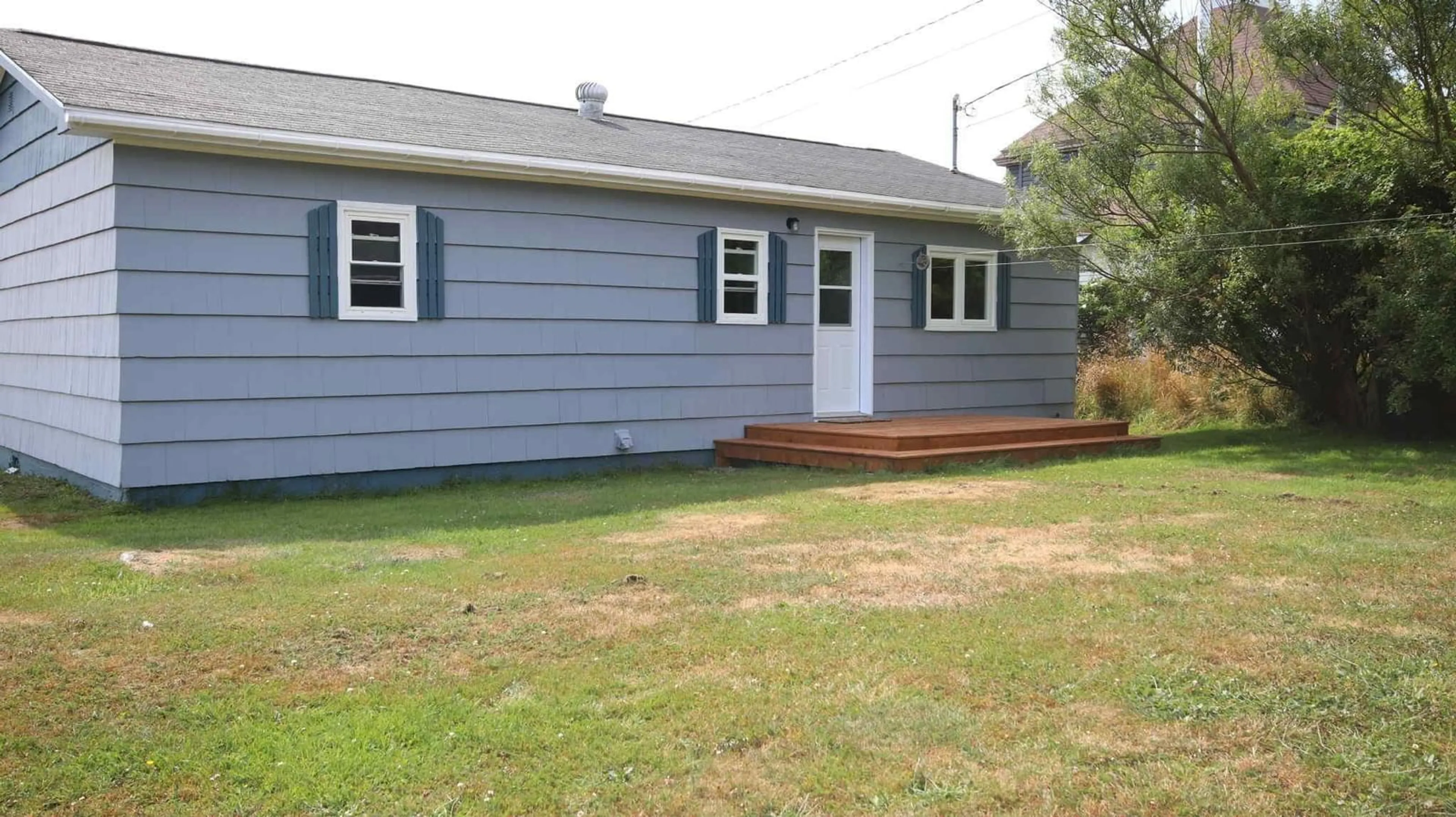 Home with vinyl exterior material, street for 5 Atlantic St, Clark's Harbour Nova Scotia B0W 1P0