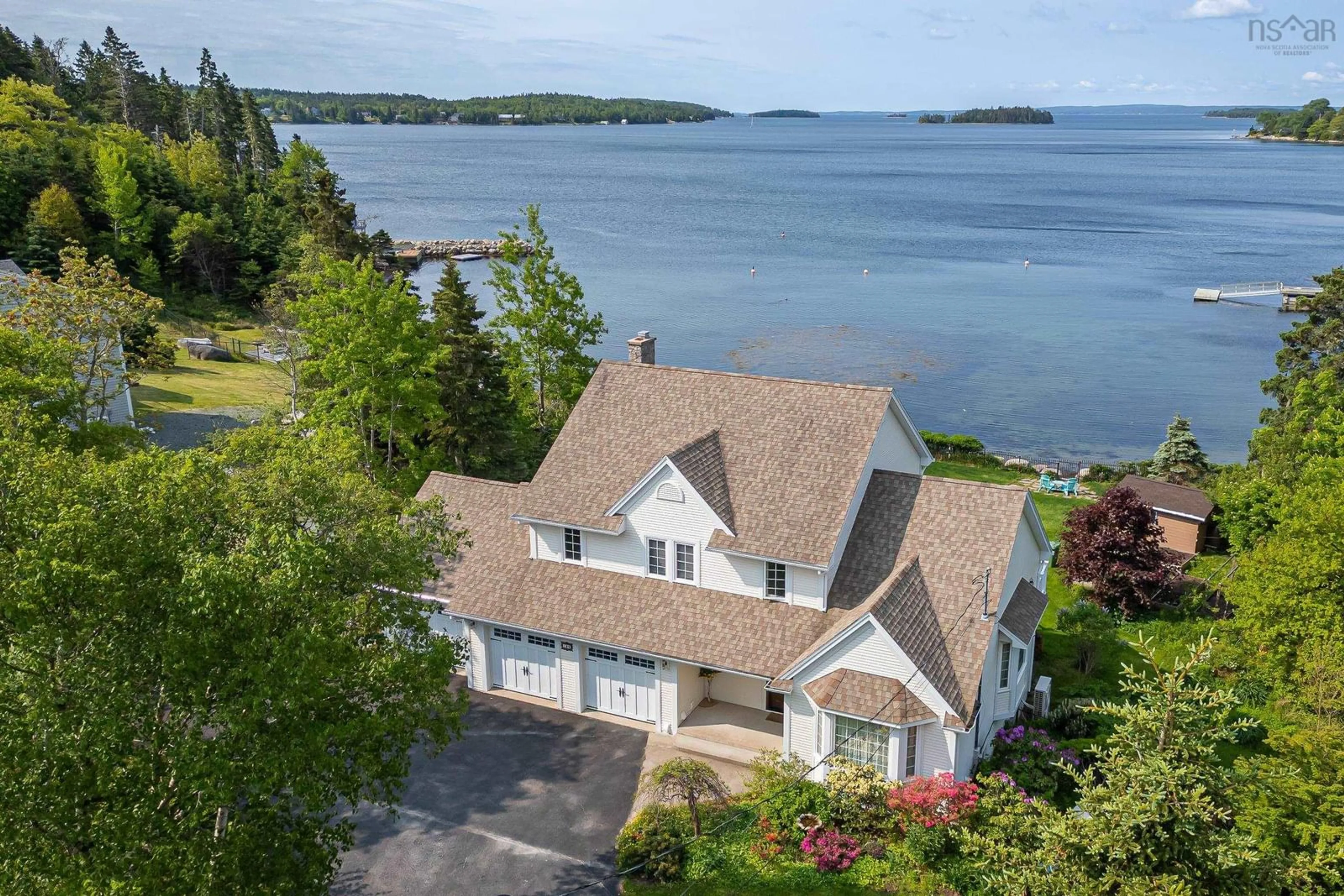 A pic from outside/outdoor area/front of a property/back of a property/a pic from drone, water/lake/river/ocean view for 129 Masons Point Rd, Head Of St. Margarets Bay Nova Scotia B3Z 1Y9