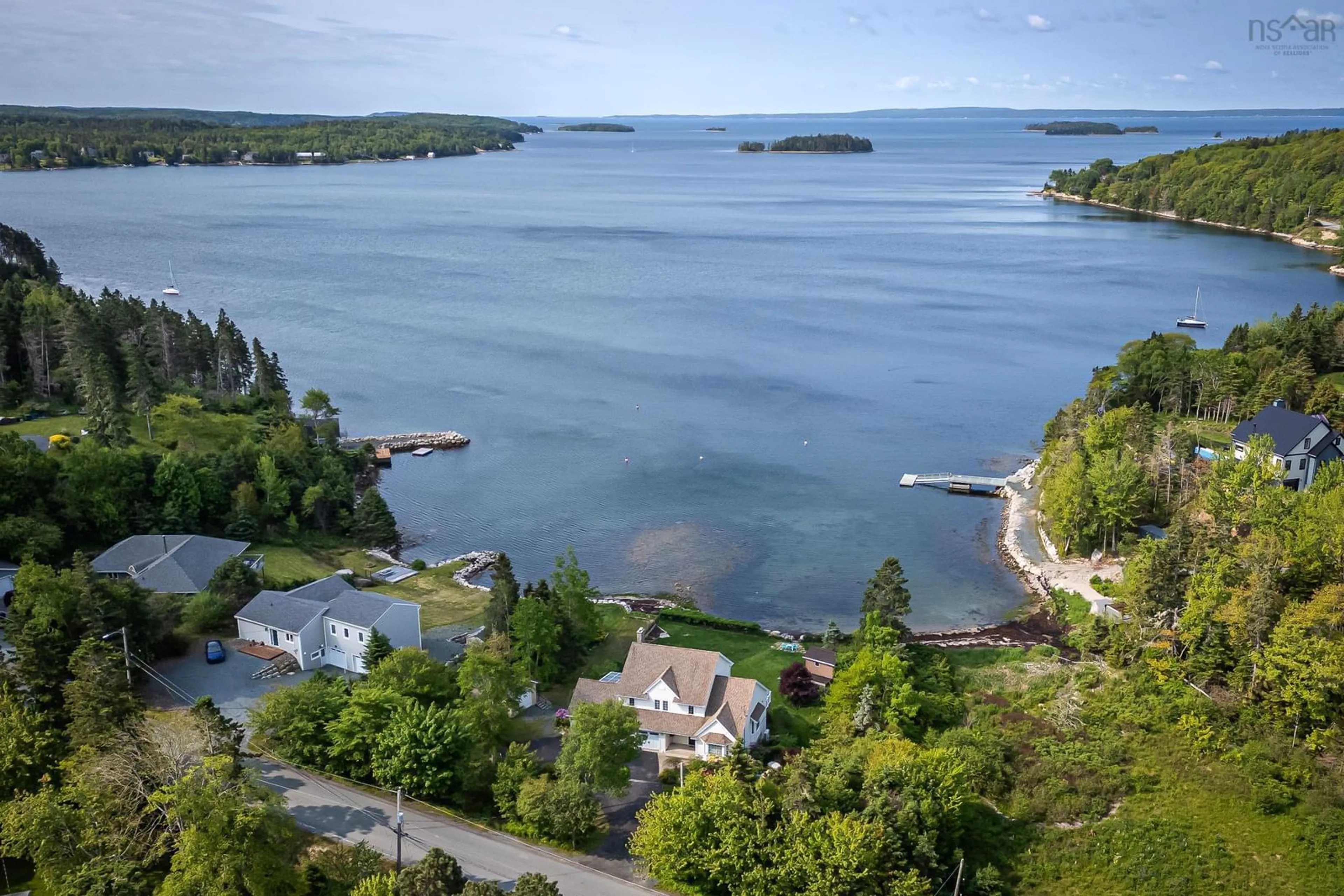 A pic from outside/outdoor area/front of a property/back of a property/a pic from drone, water/lake/river/ocean view for 129 Masons Point Rd, Head Of St. Margarets Bay Nova Scotia B3Z 1Y9