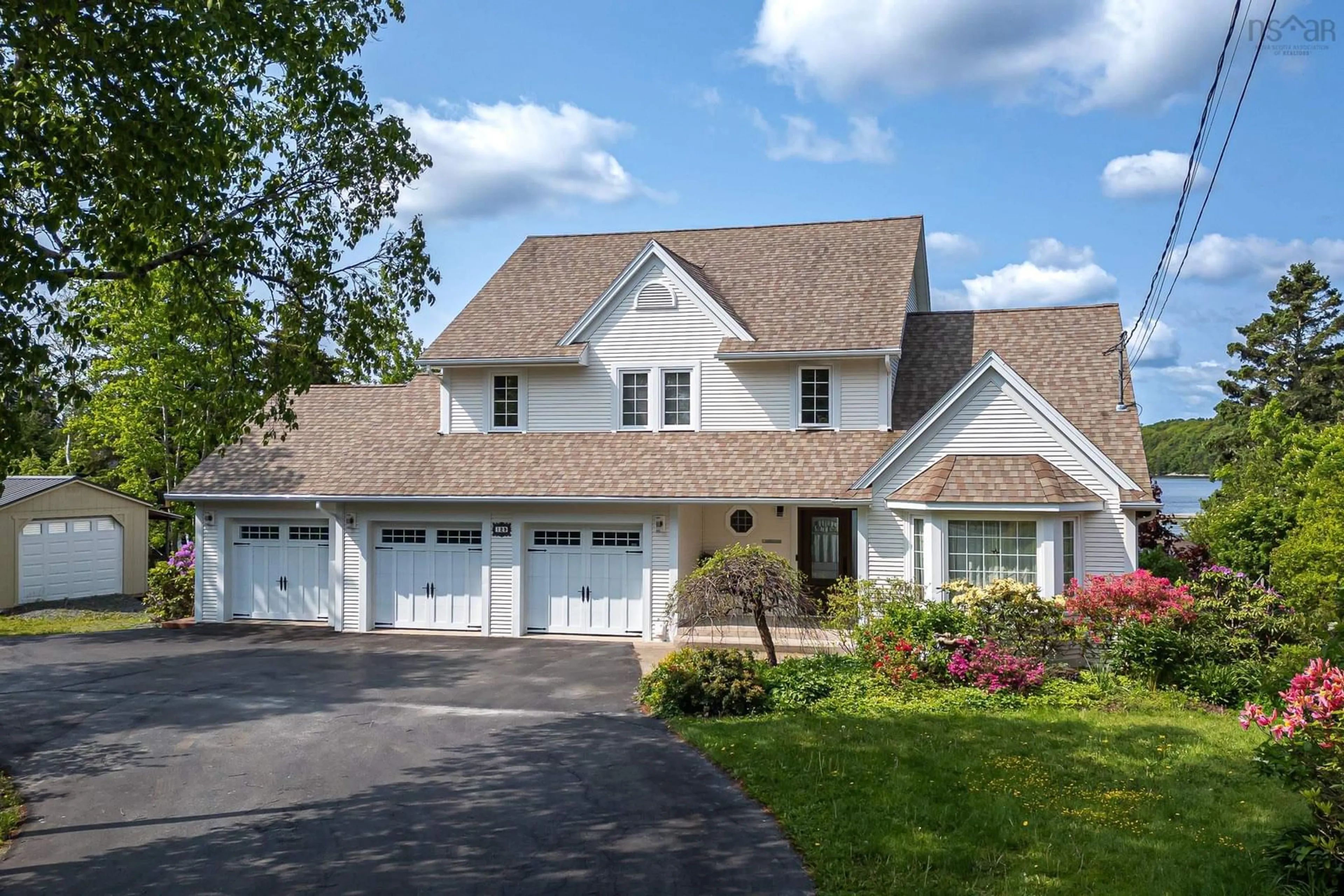Home with vinyl exterior material, street for 129 Masons Point Rd, Head Of St. Margarets Bay Nova Scotia B3Z 1Y9
