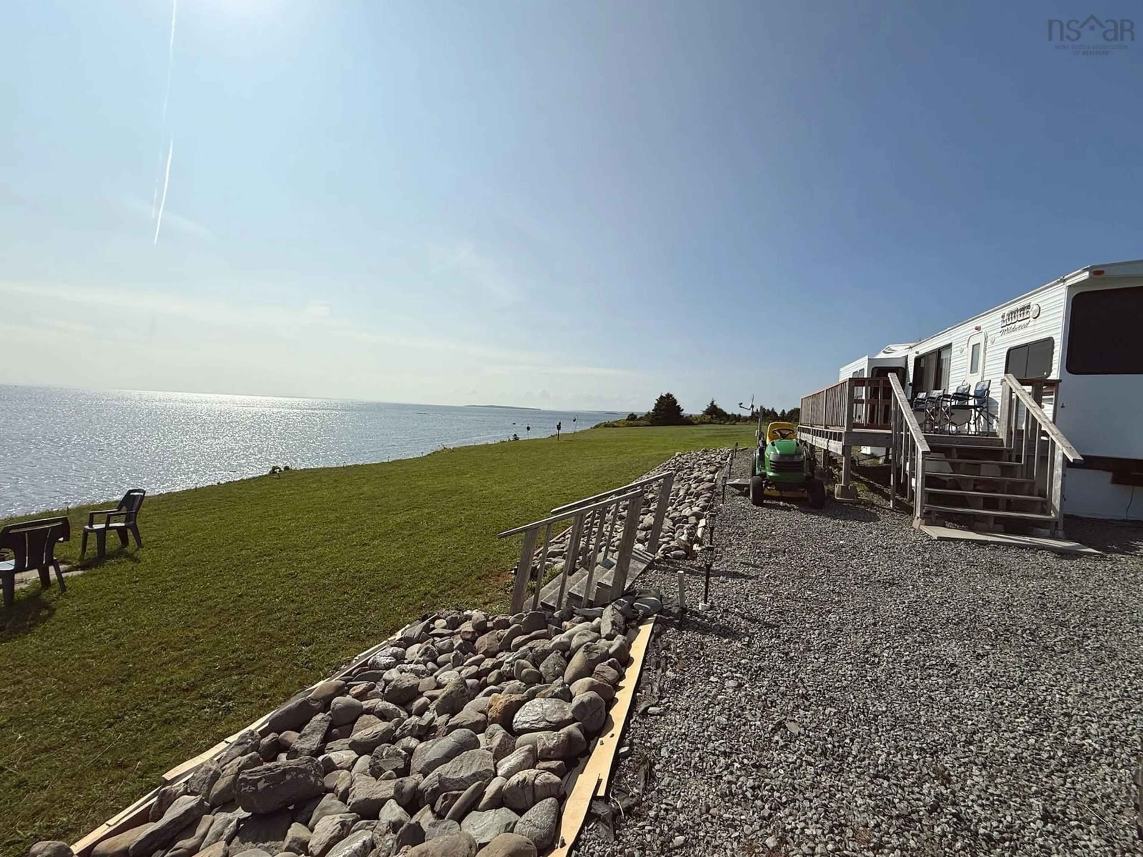 A pic from outside/outdoor area/front of a property/back of a property/a pic from drone, water/lake/river/ocean view for Shore Rd, Lower L'Ardoise Nova Scotia B0E 1W0