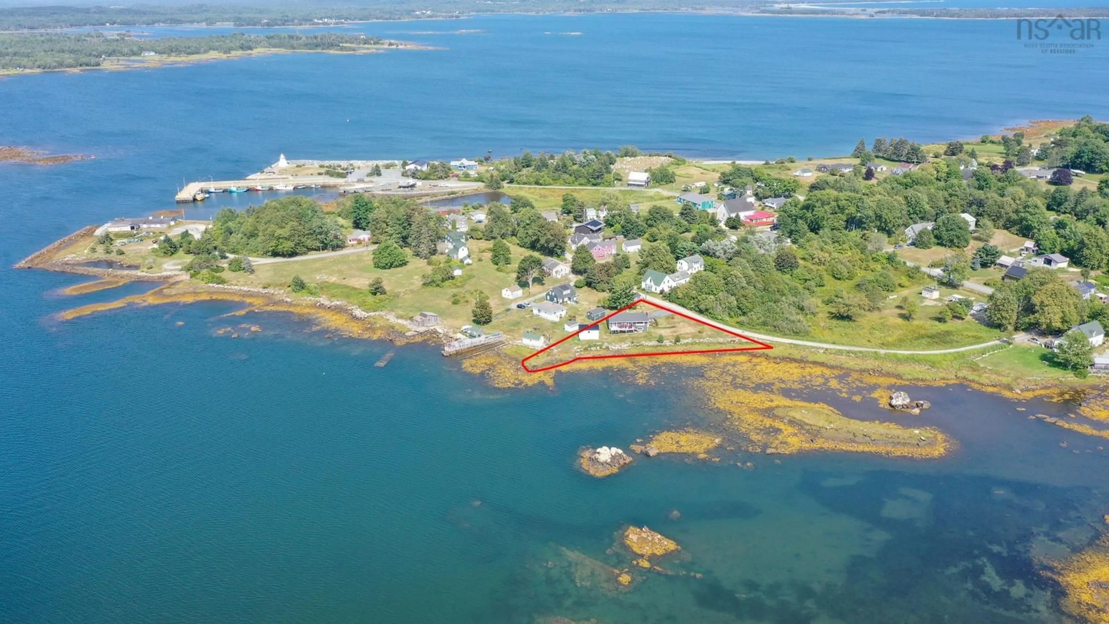 A pic from outside/outdoor area/front of a property/back of a property/a pic from drone, water/lake/river/ocean view for 31 Medway St, Port Medway Nova Scotia B0J 2T0