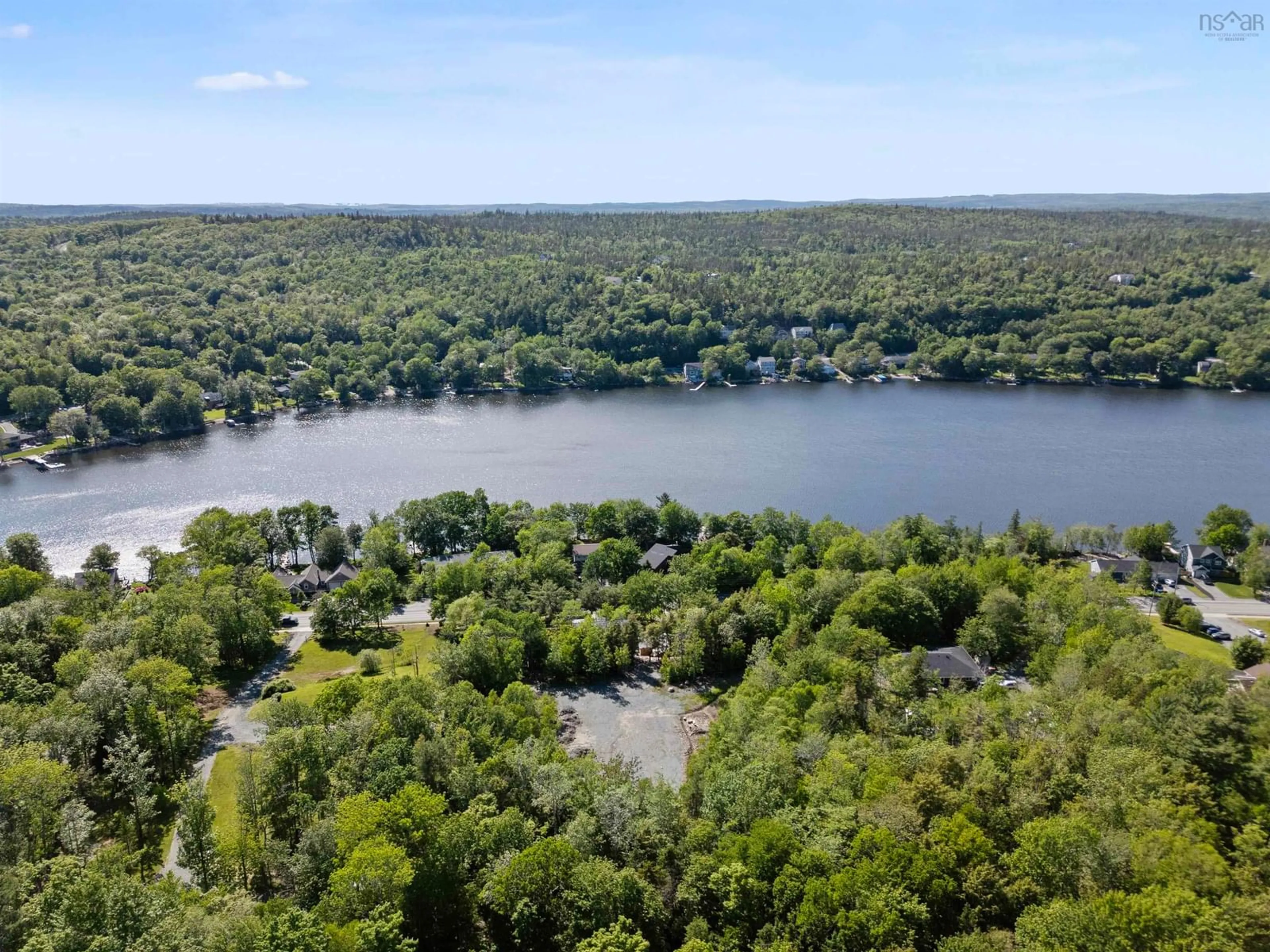 A pic from outside/outdoor area/front of a property/back of a property/a pic from drone, water/lake/river/ocean view for 3650 Highway 2 Hwy, Fletchers Lake Nova Scotia B2T 1H7