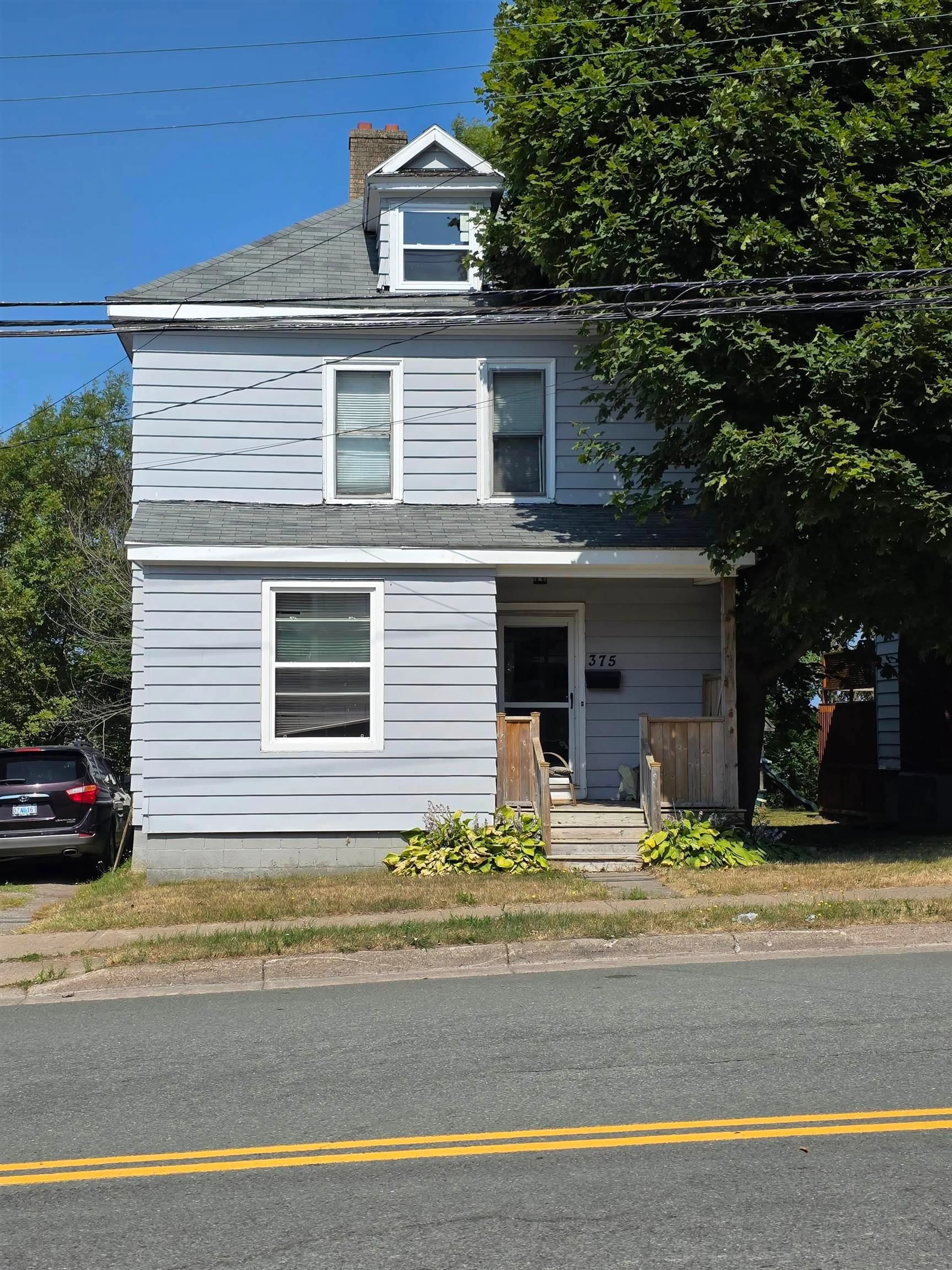 Home with vinyl exterior material, street for 375 Townsend St, Sydney Nova Scotia B1P 5G3