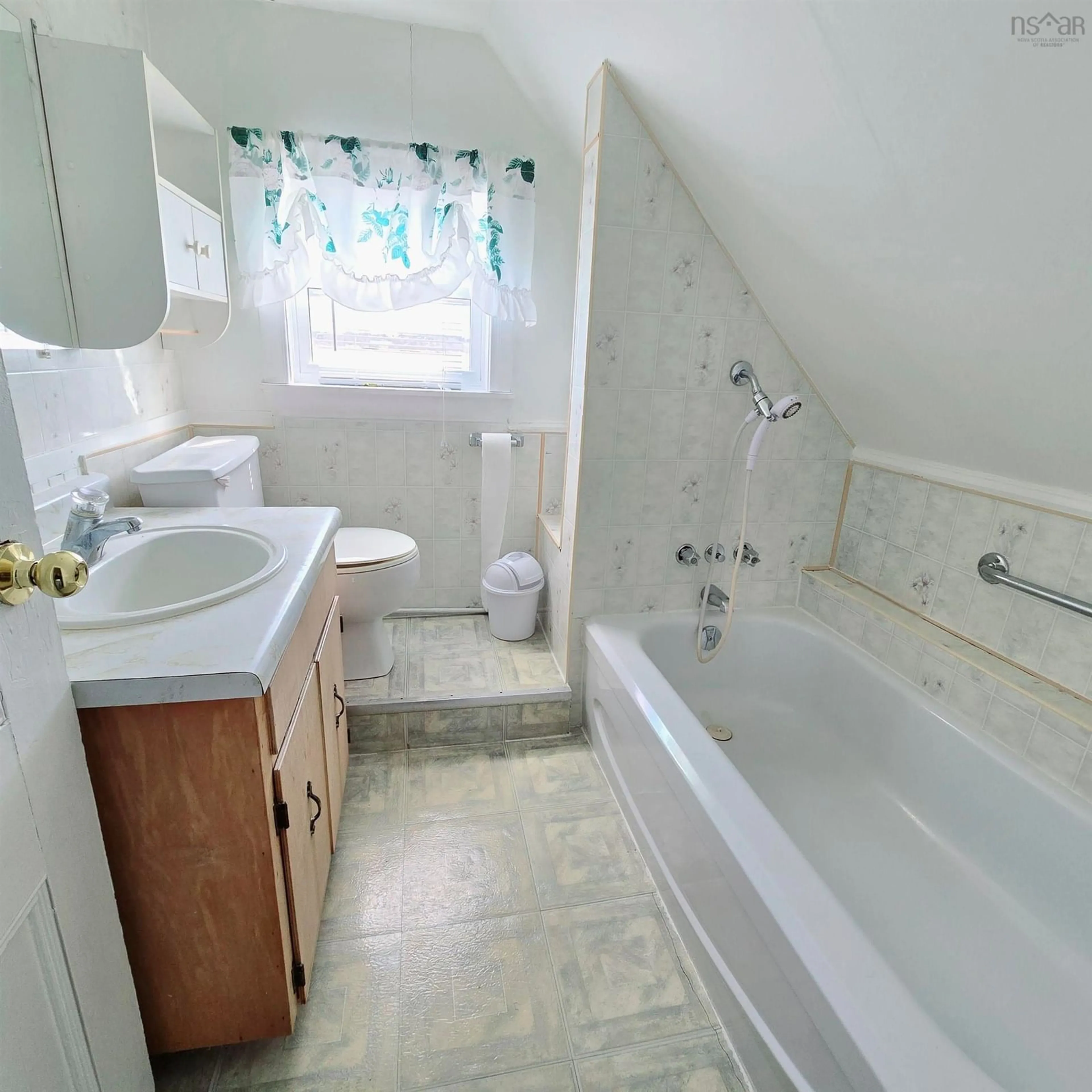 Standard bathroom, ceramic/tile floor for 1 Hillside Boularderie Rd, Groves Point Nova Scotia B1Y 2X4