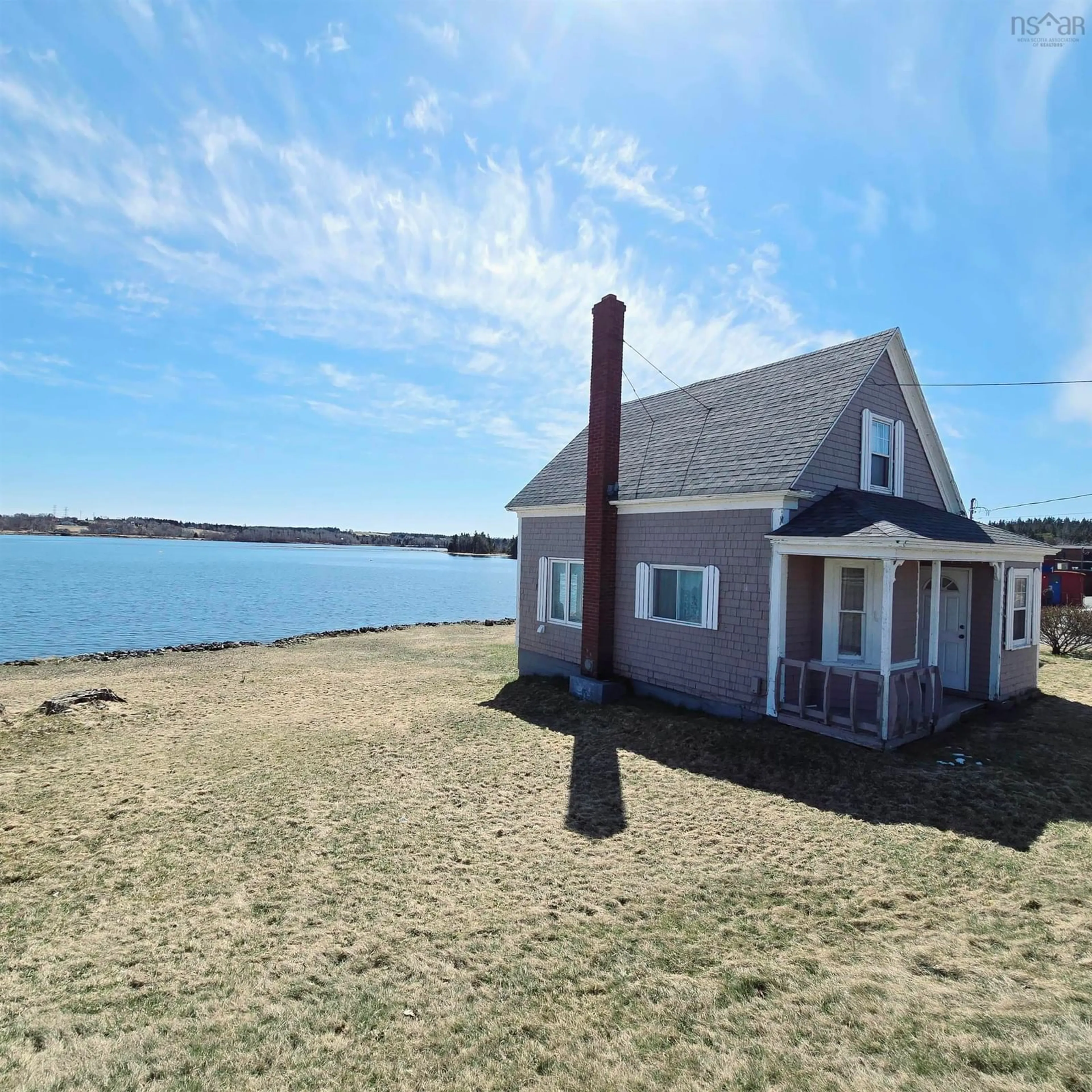 A pic from outside/outdoor area/front of a property/back of a property/a pic from drone, water/lake/river/ocean view for 1 Hillside Boularderie Rd, Groves Point Nova Scotia B1Y 2X4