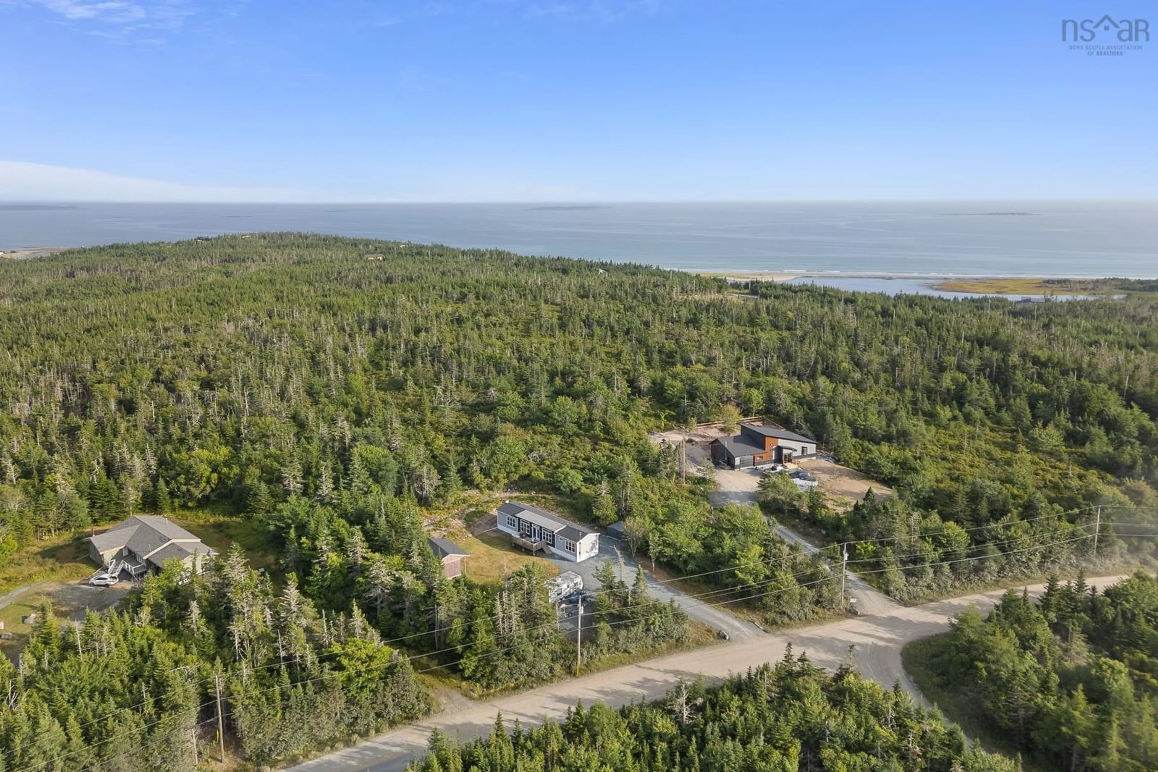 A pic from outside/outdoor area/front of a property/back of a property/a pic from drone, water/lake/river/ocean view for 8 Nebooktook Walk, Clam Bay Nova Scotia B0J 2L0