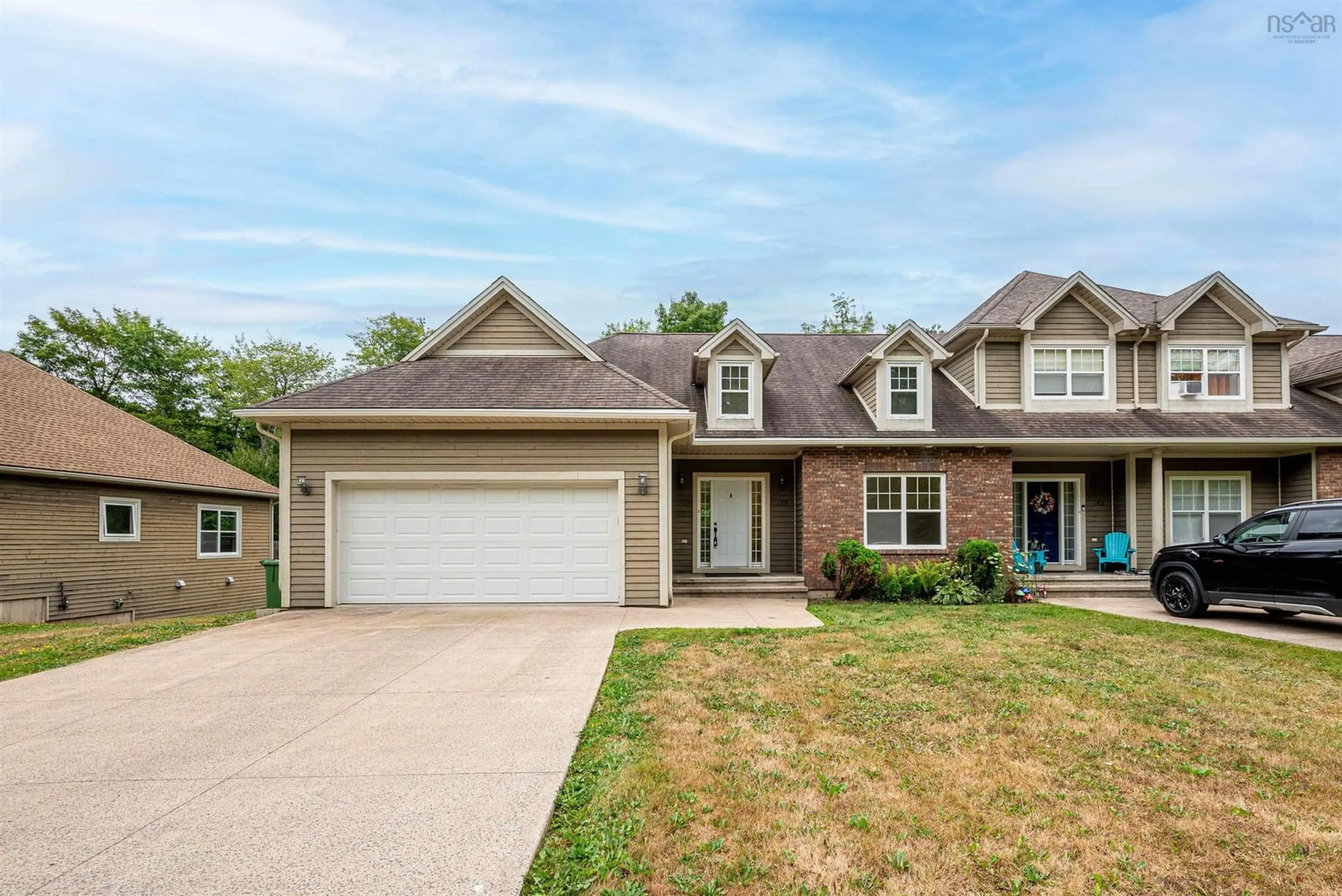 Home with brick exterior material, street for 185 Carnoustie Dr, Hammonds Plains Nova Scotia B4B 0E5