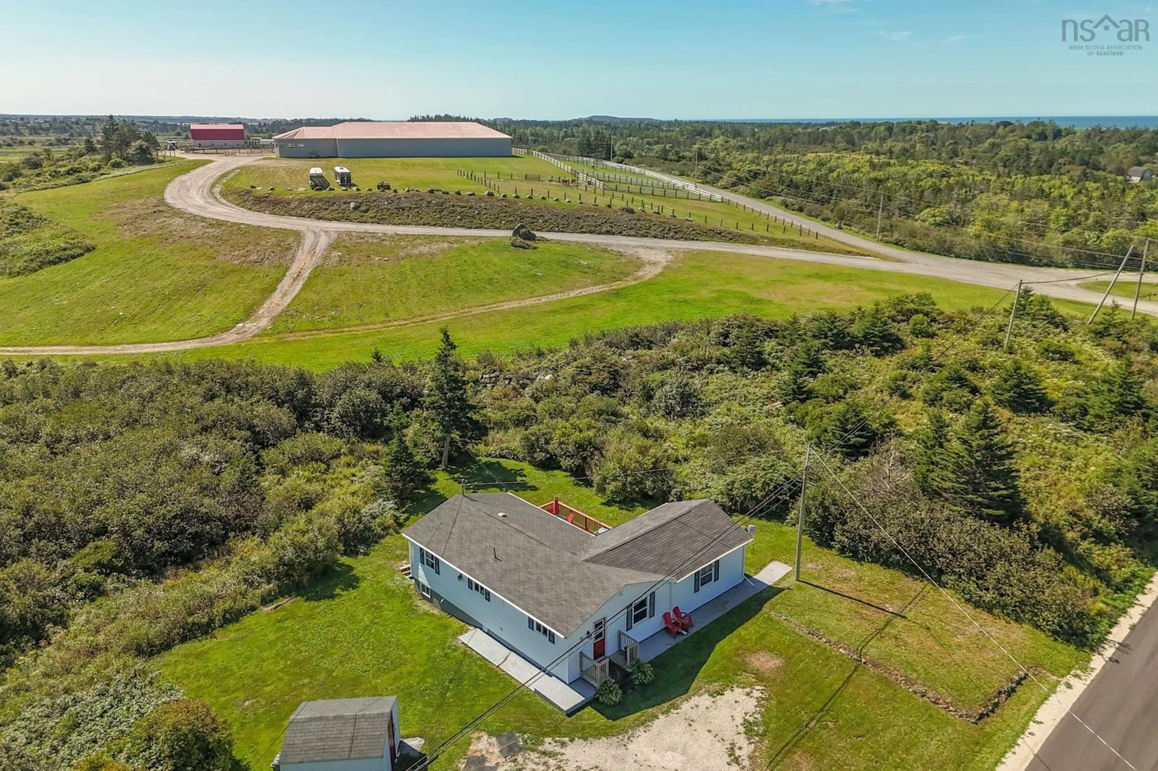 A pic from outside/outdoor area/front of a property/back of a property/a pic from drone, water/lake/river/ocean view for 73 Overton Rd, South Chegoggin Nova Scotia B5A 5G8