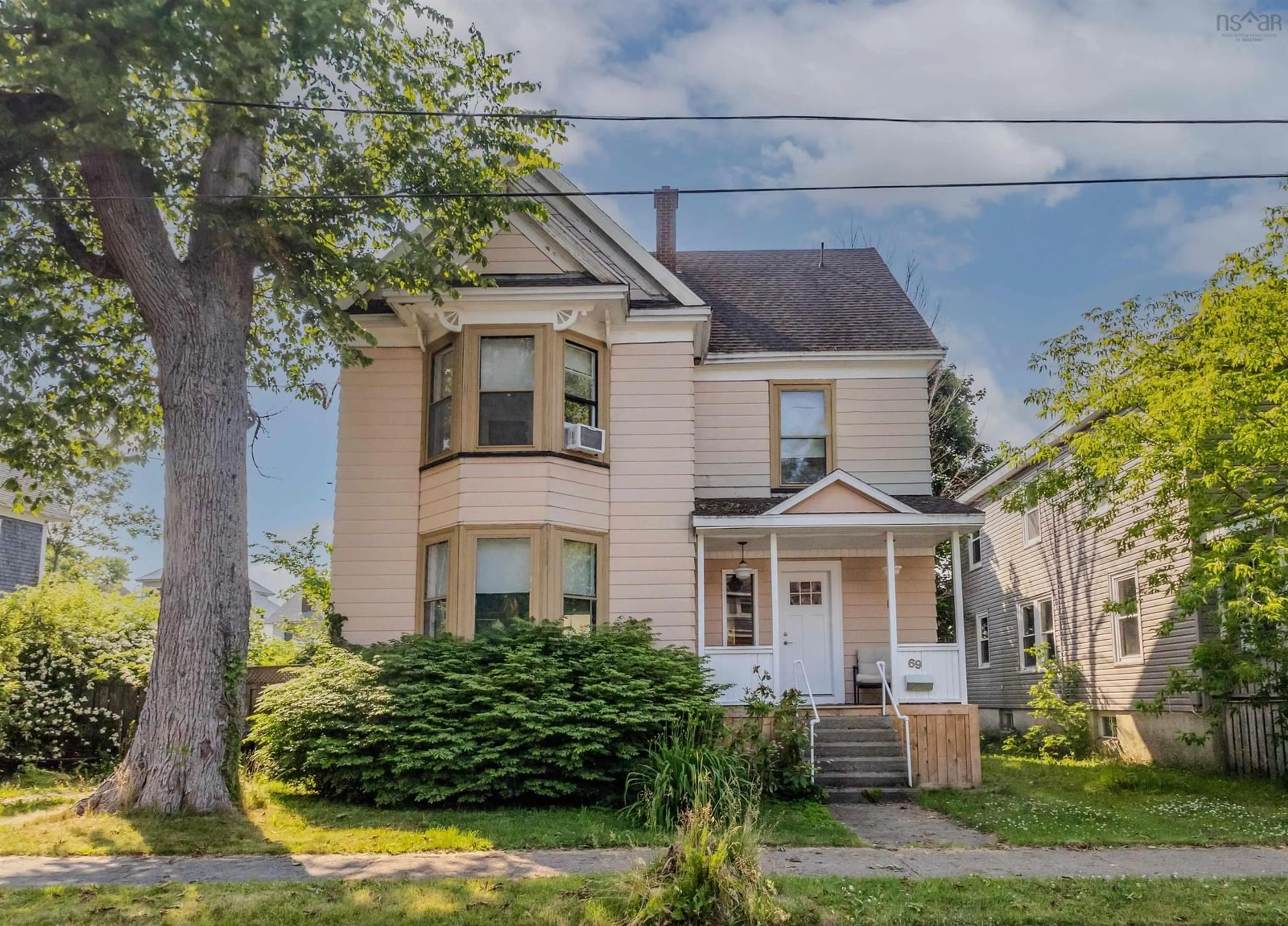 Home with vinyl exterior material, street for 69 Union St, Sydney Nova Scotia B1P 4X6
