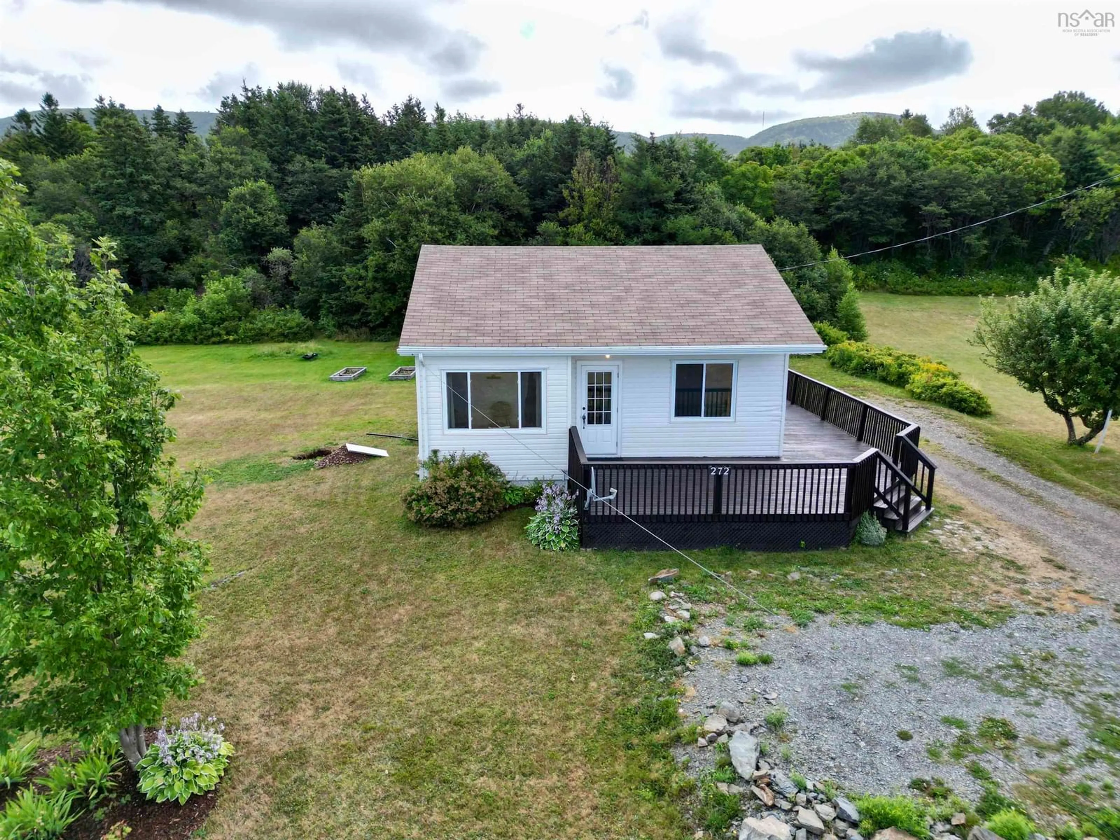 A pic from outside/outdoor area/front of a property/back of a property/a pic from drone, water/lake/river/ocean view for 272 Cheticamp Back Rd, Plateau Nova Scotia B0E 1H0