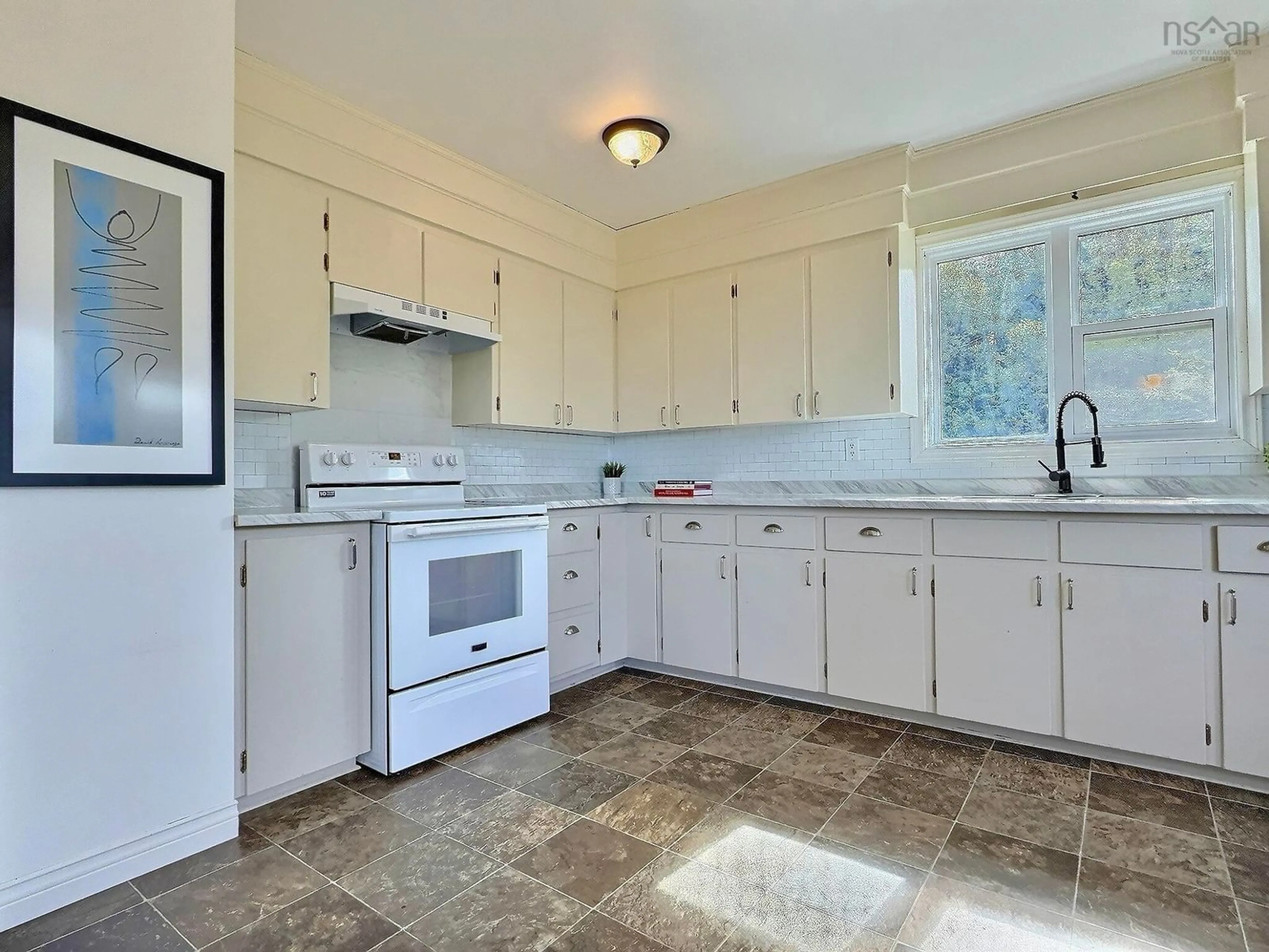 Standard kitchen, ceramic/tile floor for 272 Cheticamp Back Rd, Plateau Nova Scotia B0E 1H0