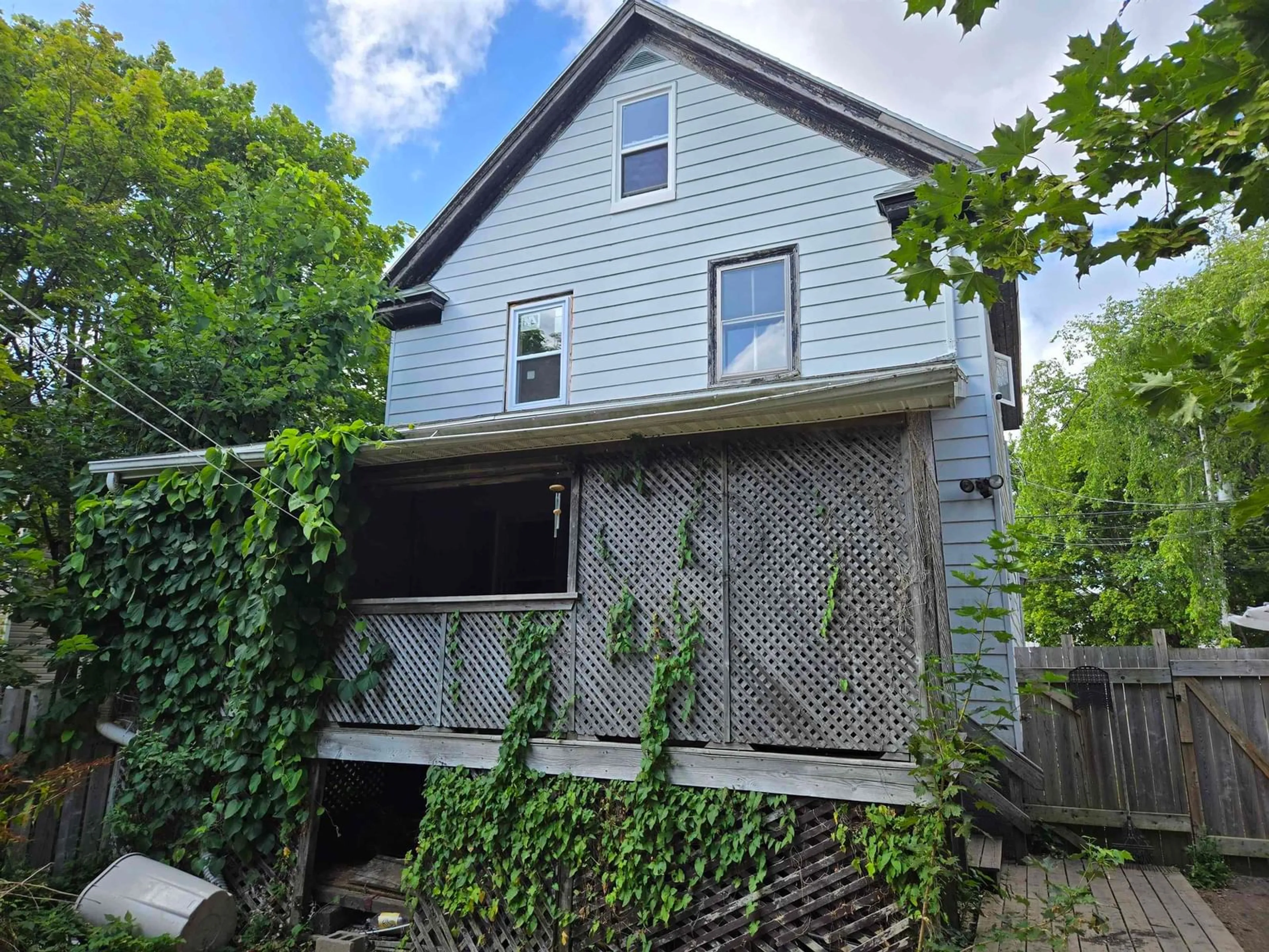 A pic from outside/outdoor area/front of a property/back of a property/a pic from drone, street for 106 Brookland St, Sydney Nova Scotia B1P 5B4