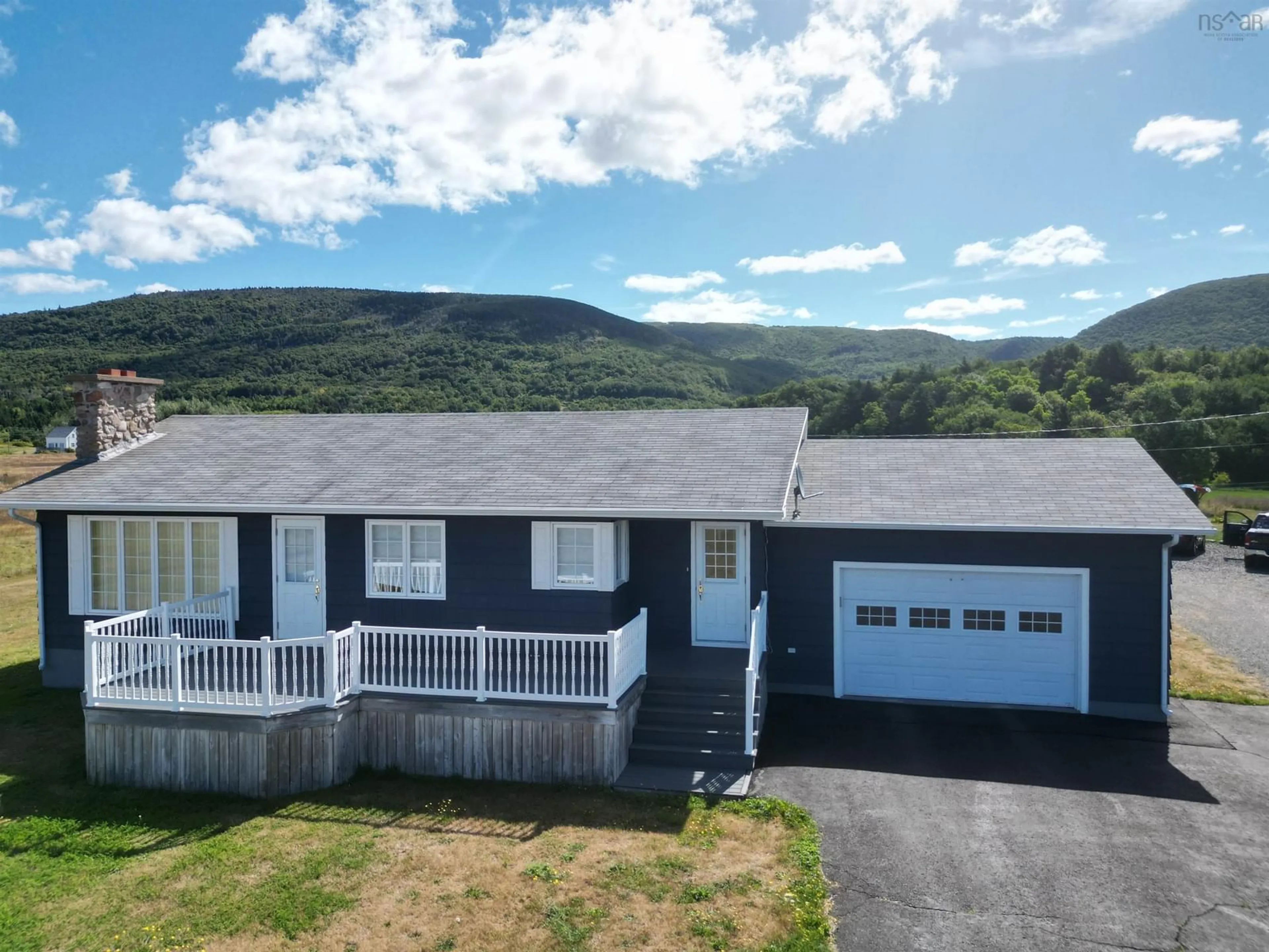 A pic from outside/outdoor area/front of a property/back of a property/a pic from drone, unknown for 13642 Cabot Trail Rd, Point Cross Nova Scotia B0E 1H0
