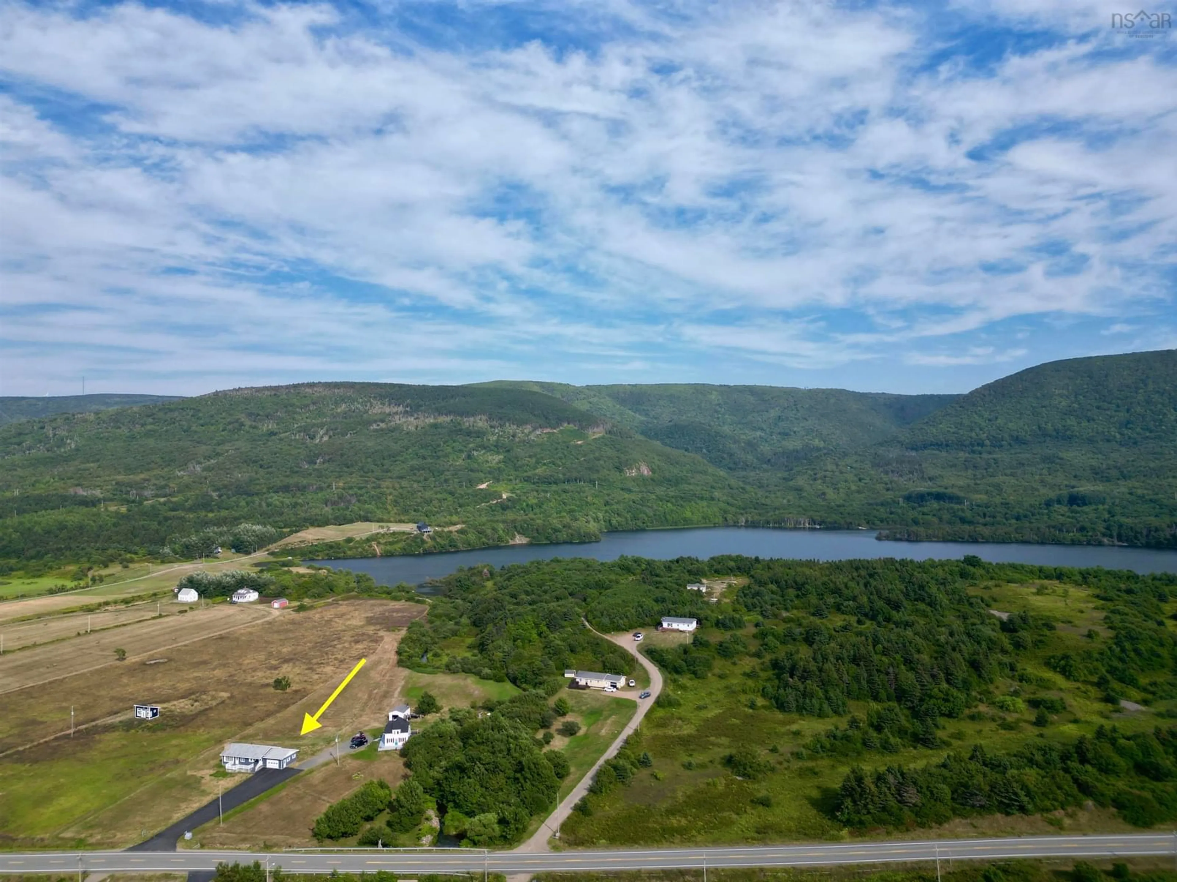 A pic from outside/outdoor area/front of a property/back of a property/a pic from drone, water/lake/river/ocean view for 13642 Cabot Trail Rd, Point Cross Nova Scotia B0E 1H0