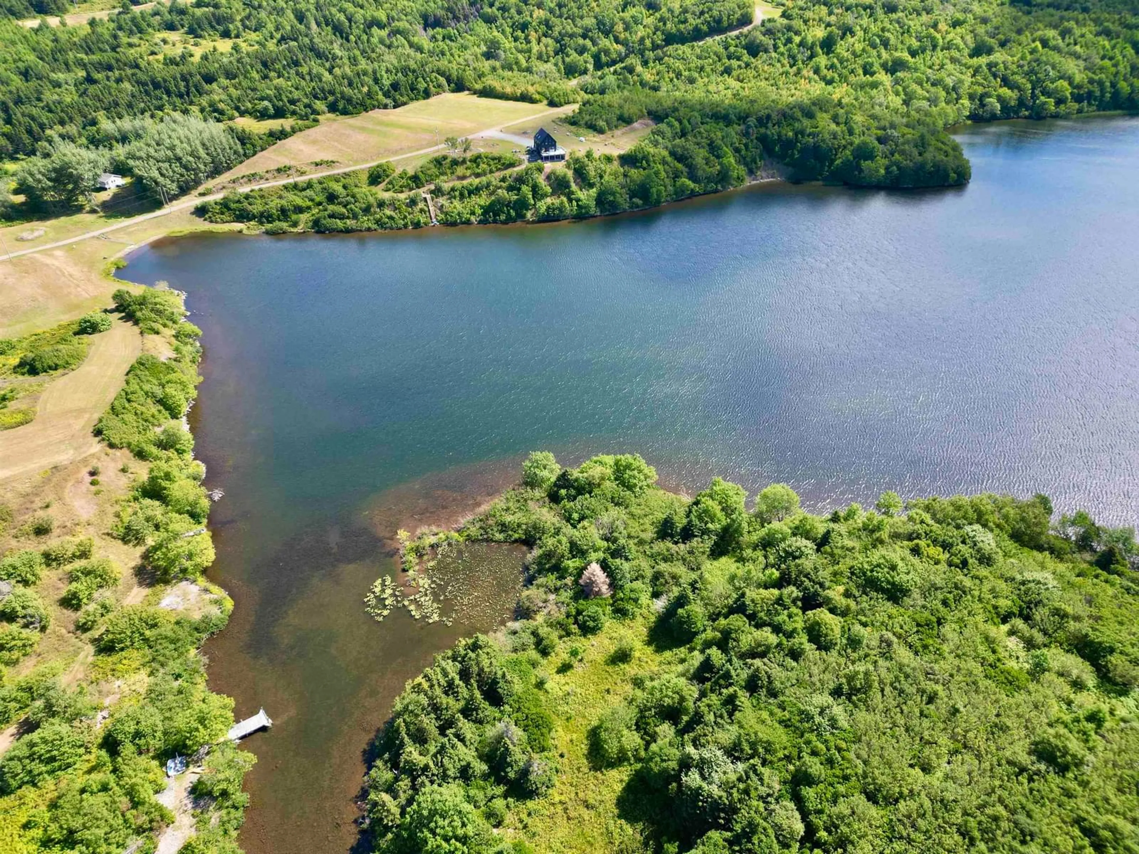 A pic from outside/outdoor area/front of a property/back of a property/a pic from drone, water/lake/river/ocean view for 13642 Cabot Trail Rd, Point Cross Nova Scotia B0E 1H0