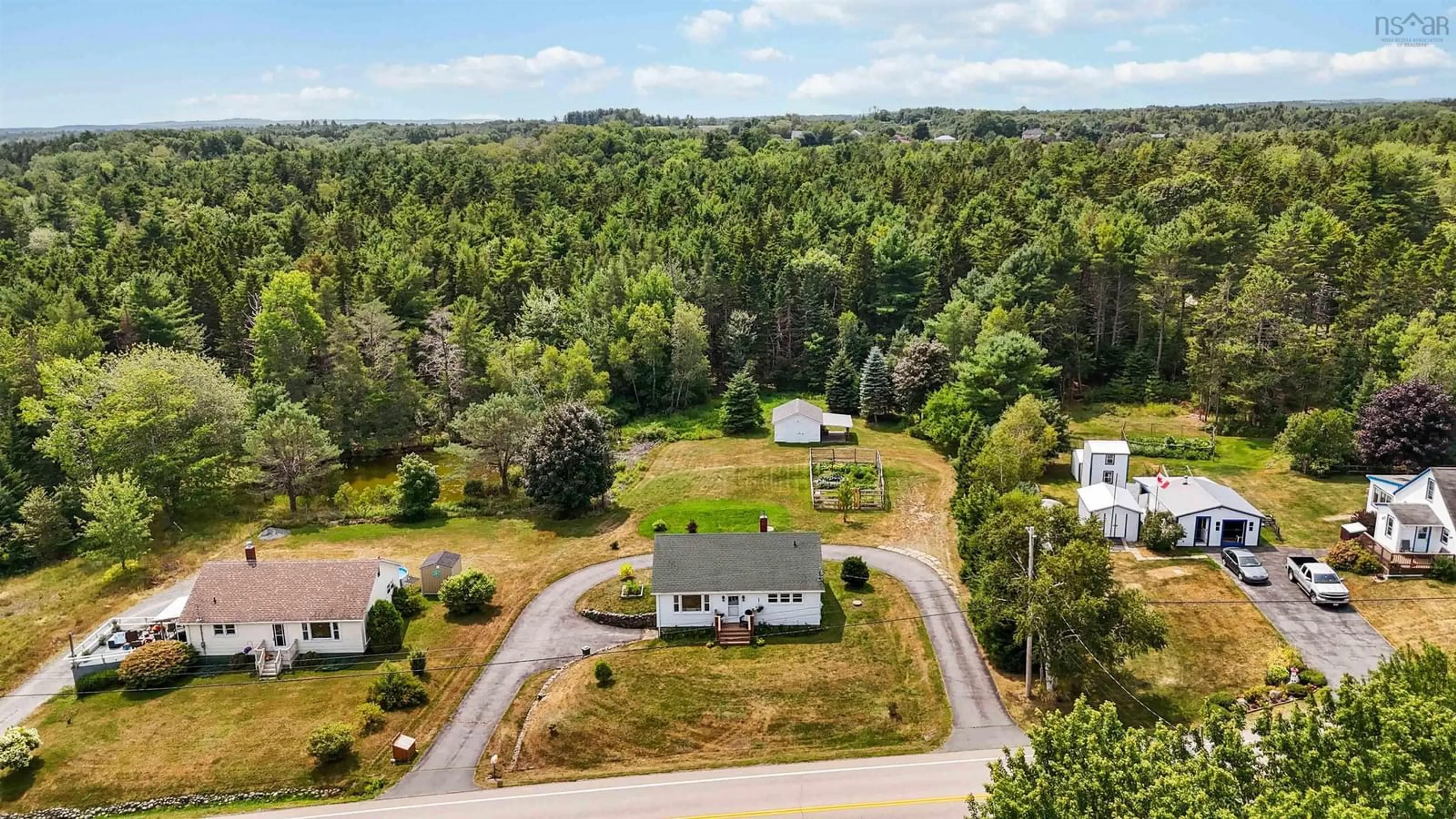 A pic from outside/outdoor area/front of a property/back of a property/a pic from drone, forest/trees view for 11407 Highway 3, Centre Nova Scotia B0J 2C0