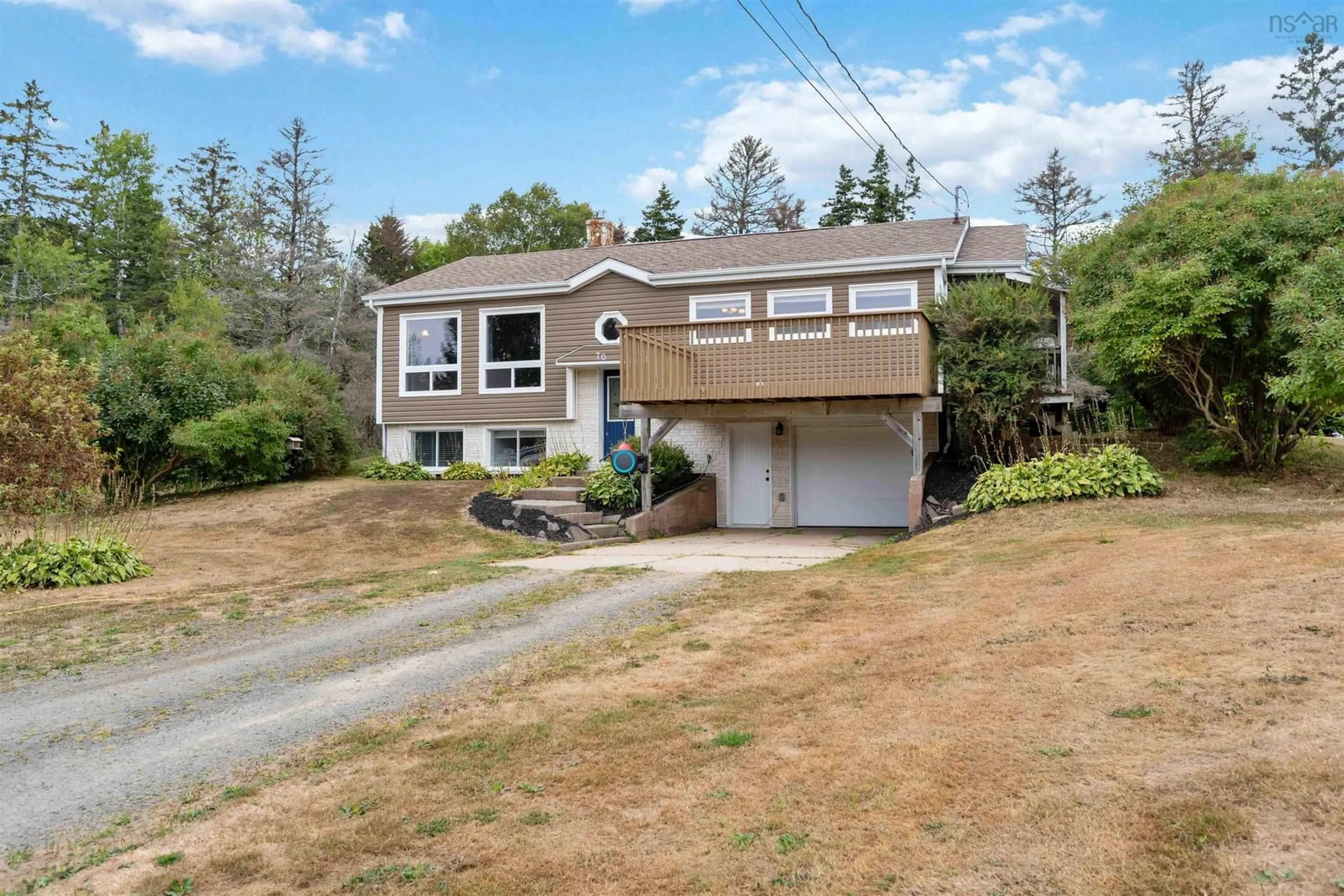 Home with vinyl exterior material, street for 76 Marsh Rd, Brighton Nova Scotia B0V 1A0