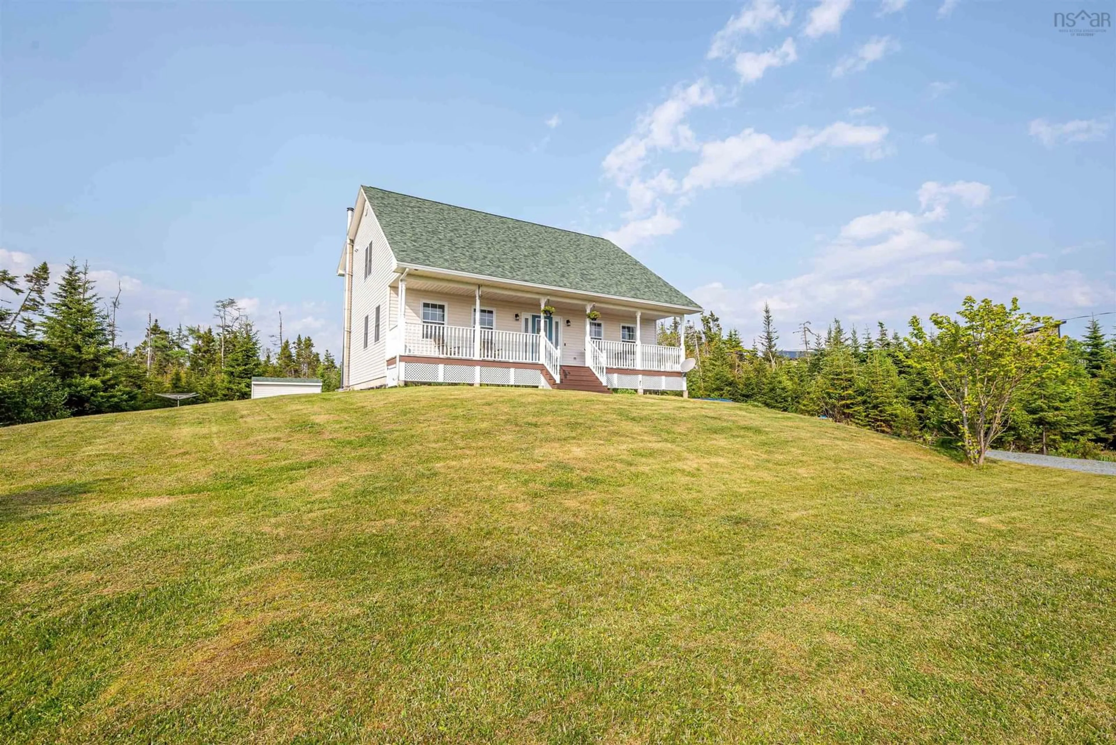 A pic from outside/outdoor area/front of a property/back of a property/a pic from drone, water/lake/river/ocean view for 297 Leslie Rd, East Lawrencetown Nova Scotia B2Z 1T4