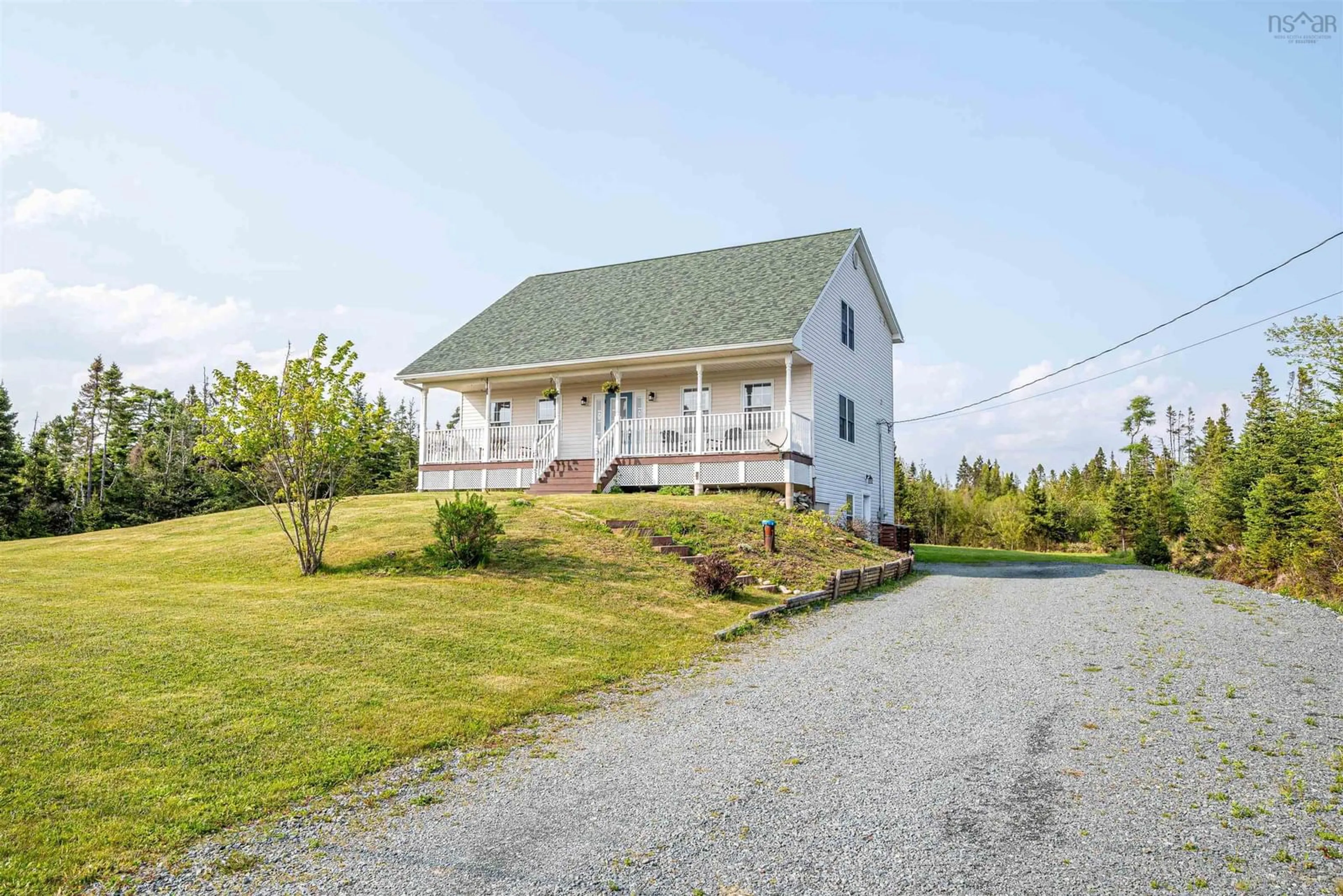 A pic from outside/outdoor area/front of a property/back of a property/a pic from drone, unknown for 297 Leslie Rd, East Lawrencetown Nova Scotia B2Z 1T4