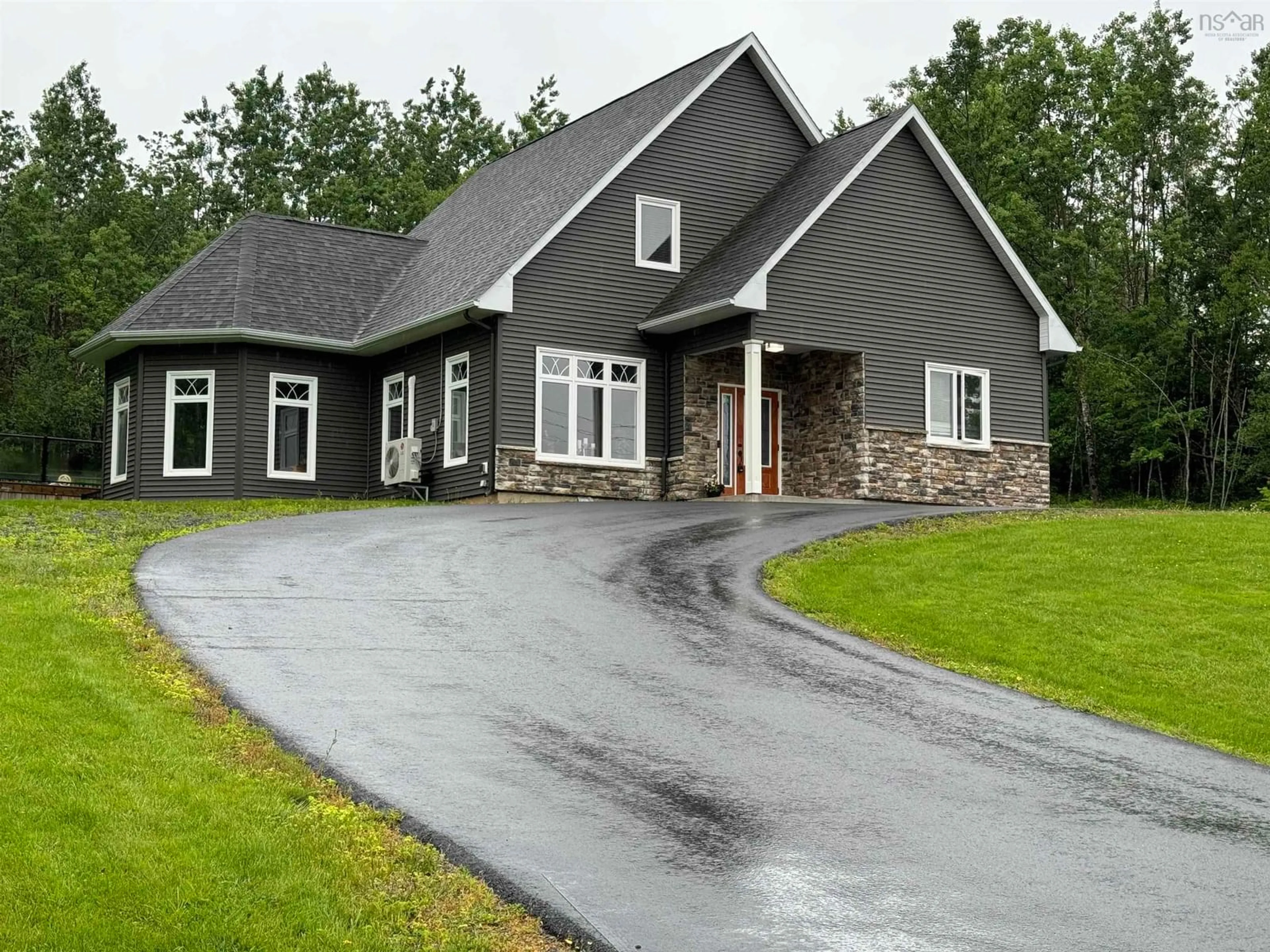 Home with vinyl exterior material, street for 77 Fir Ave, Salmon River Nova Scotia B2N 6P6