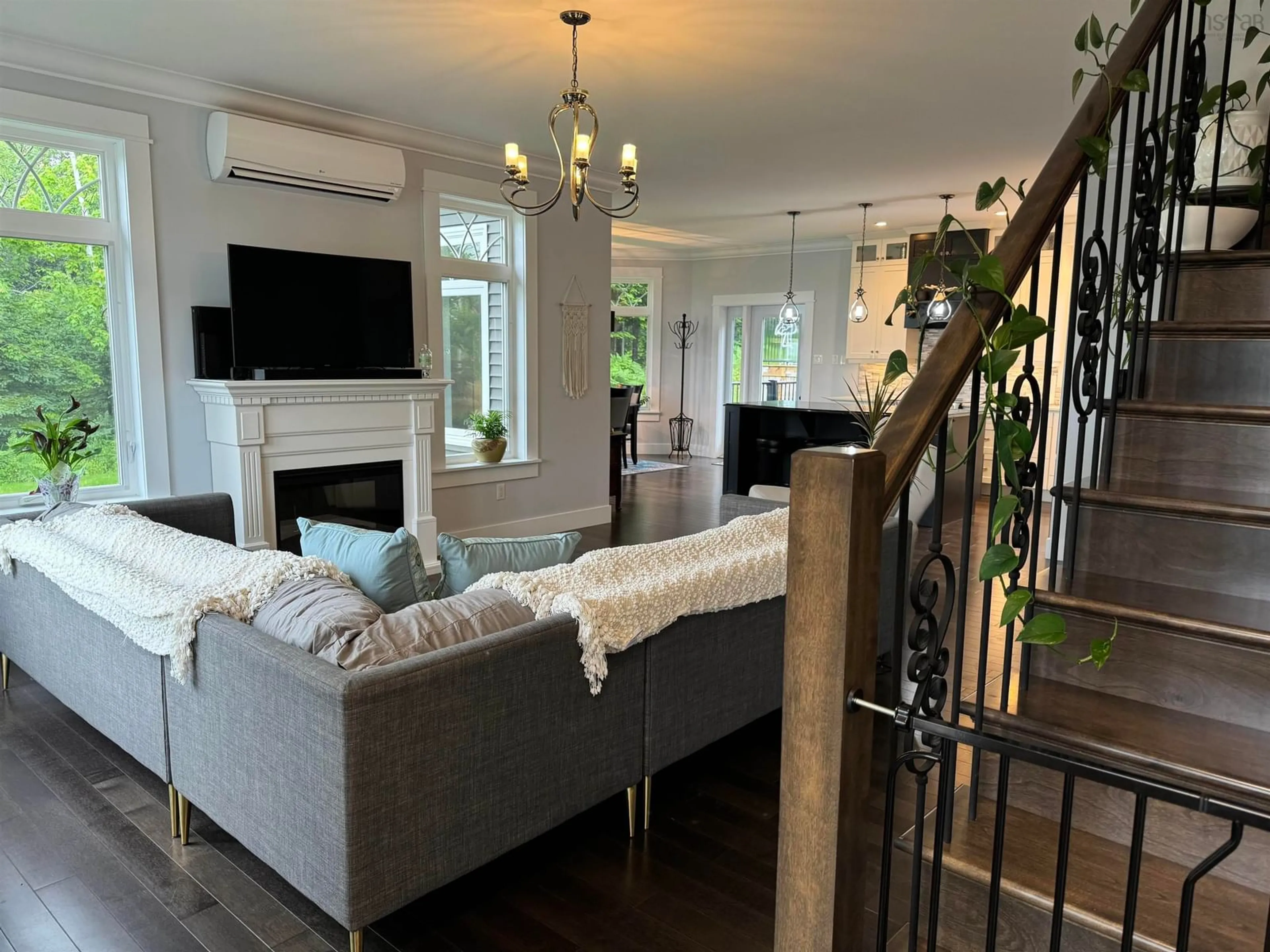 Living room with furniture, wood/laminate floor for 77 Fir Ave, Salmon River Nova Scotia B2N 6P6