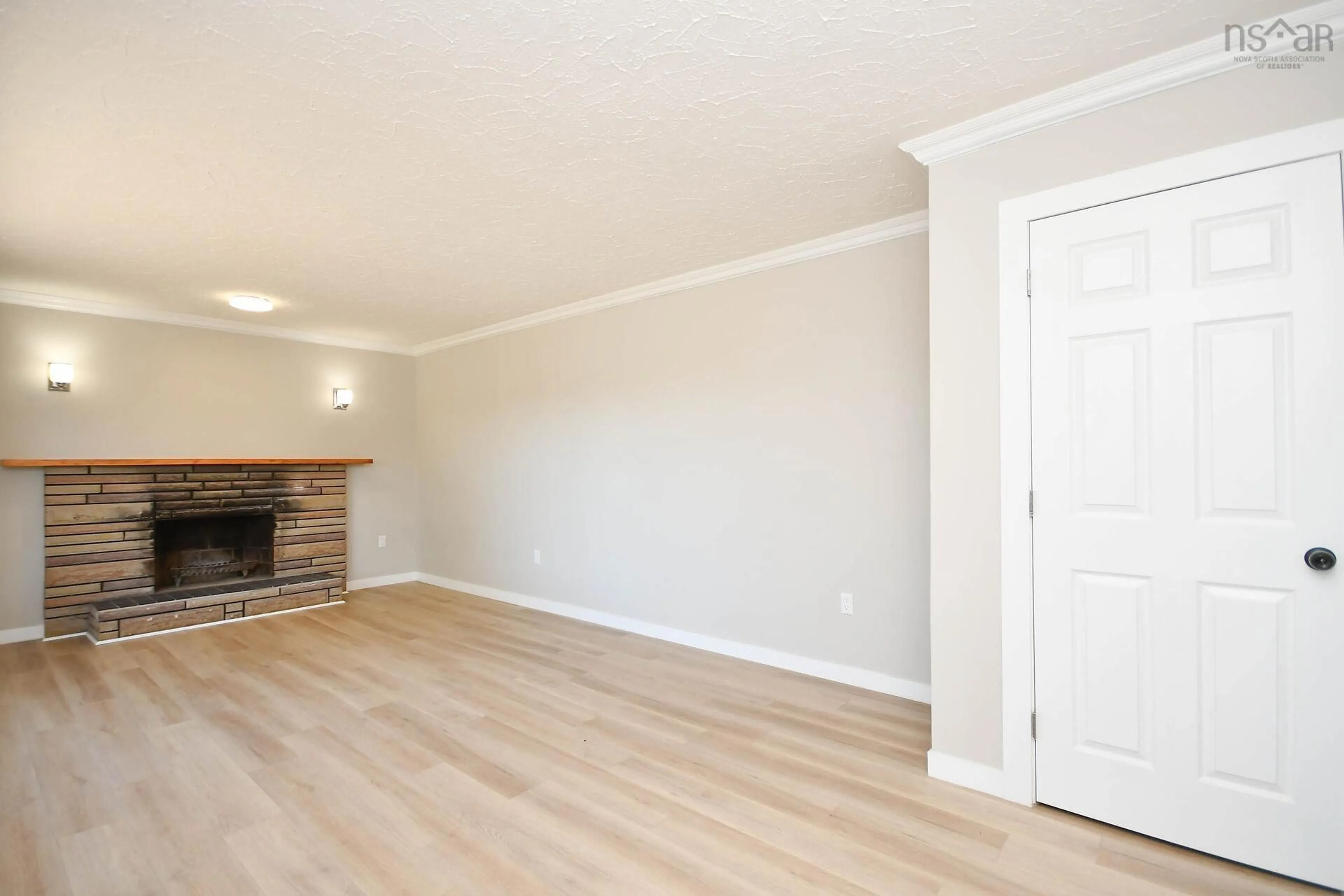 Living room with furniture, wood/laminate floor for 18 Bissett Rd, Cole Harbour Nova Scotia B2V 2T1